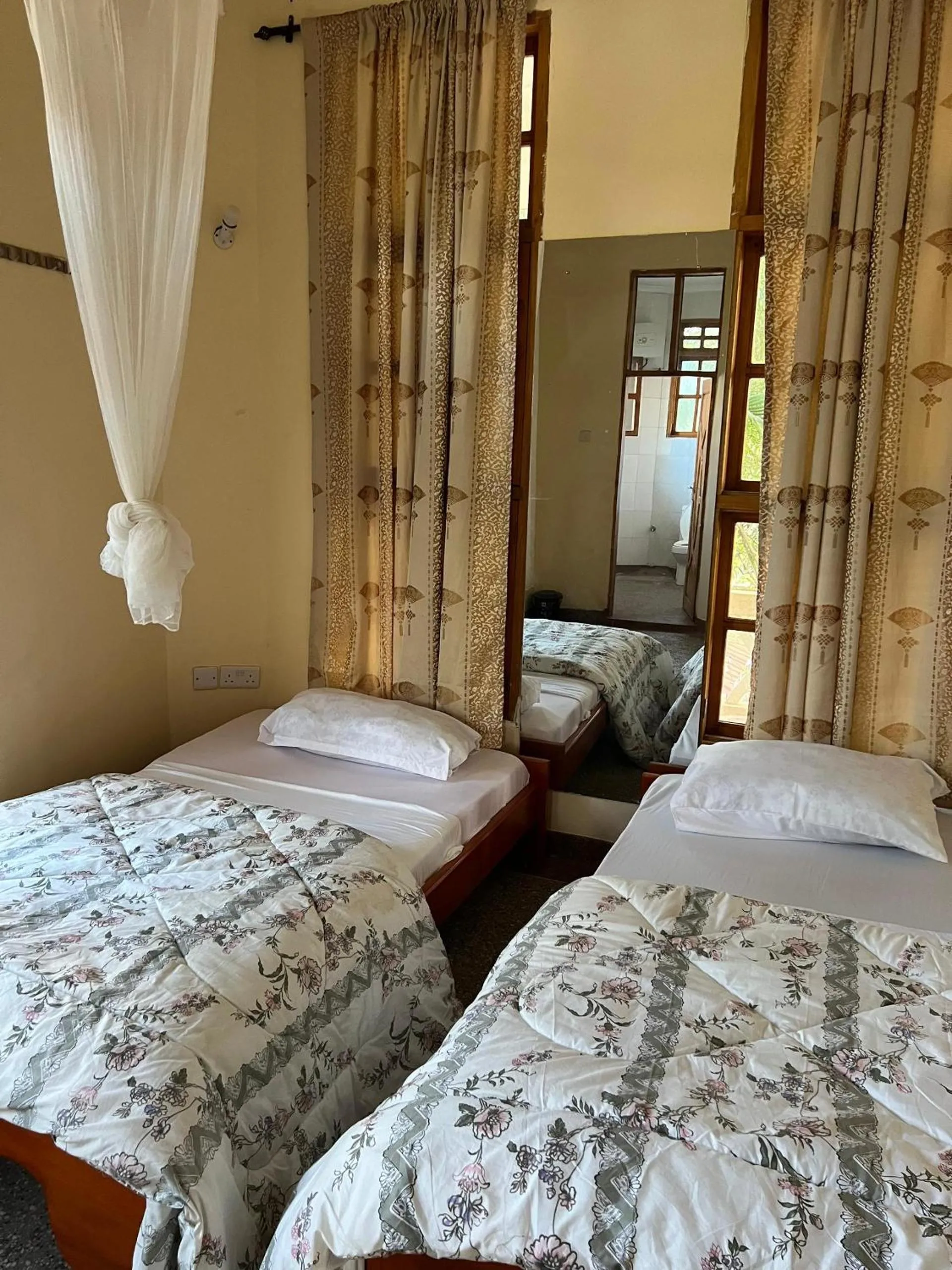 Bed in The Paradise Inn Kilimanjaro