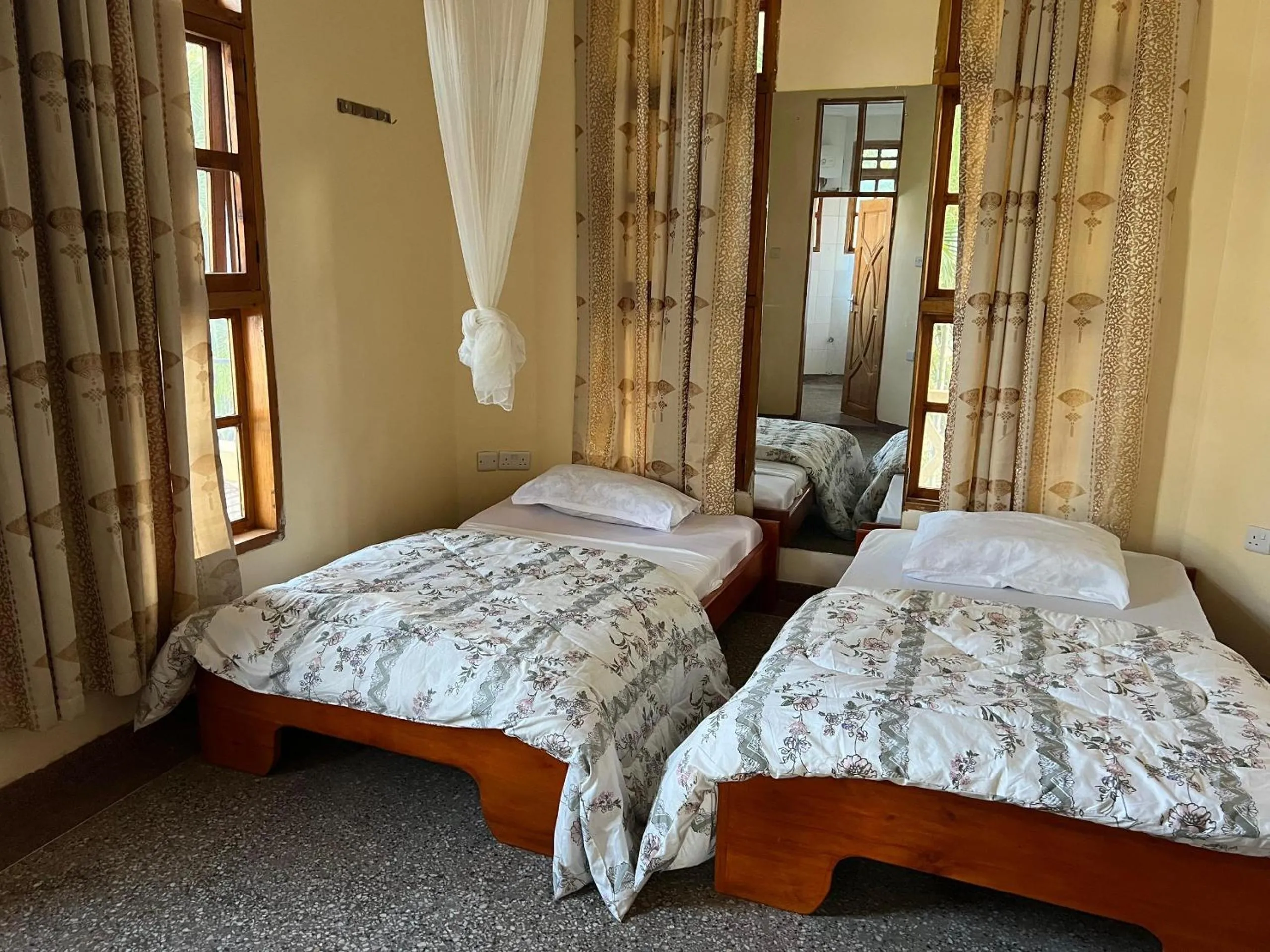 Bed in The Paradise Inn Kilimanjaro