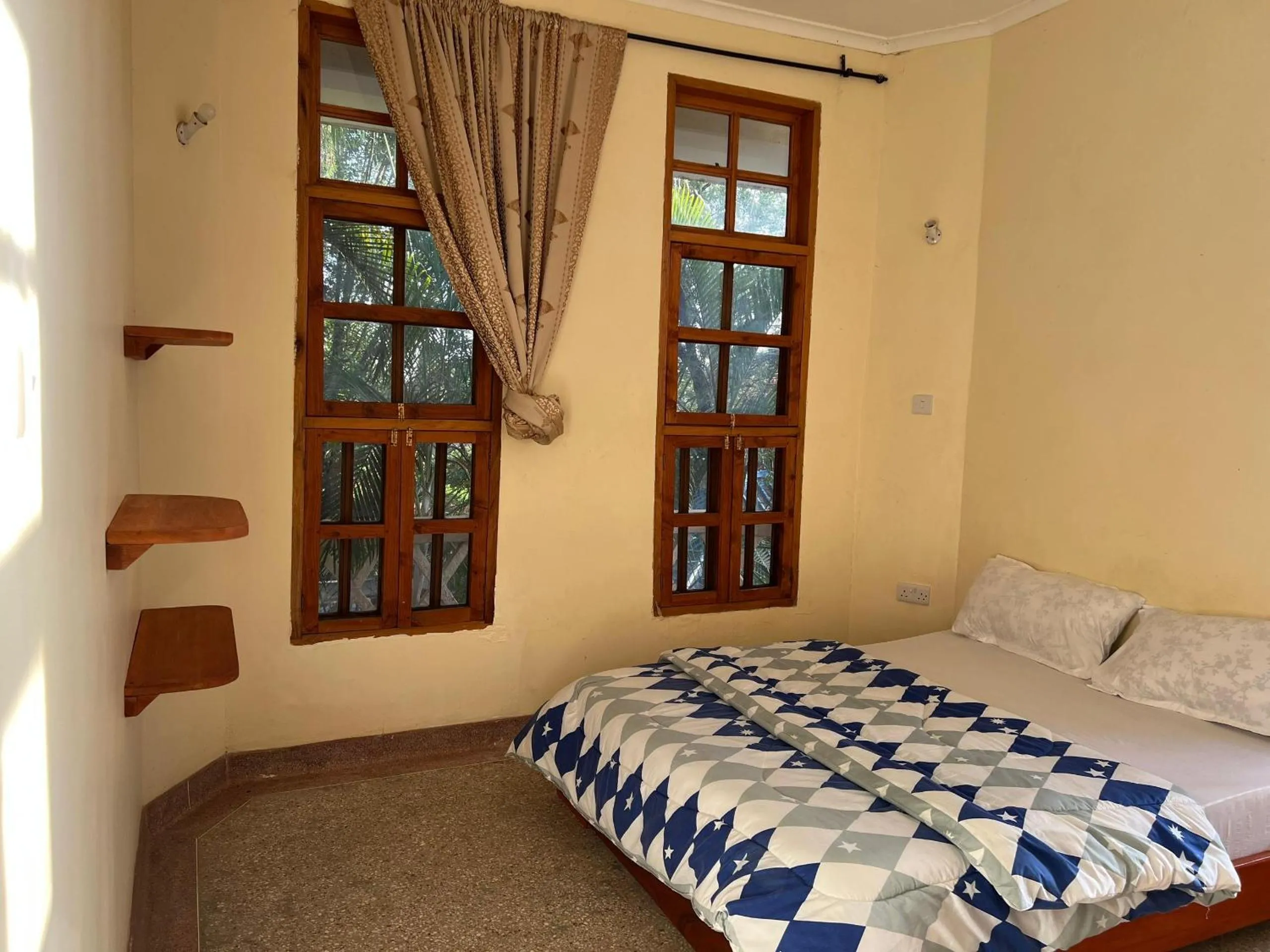 Bed in The Paradise Inn Kilimanjaro
