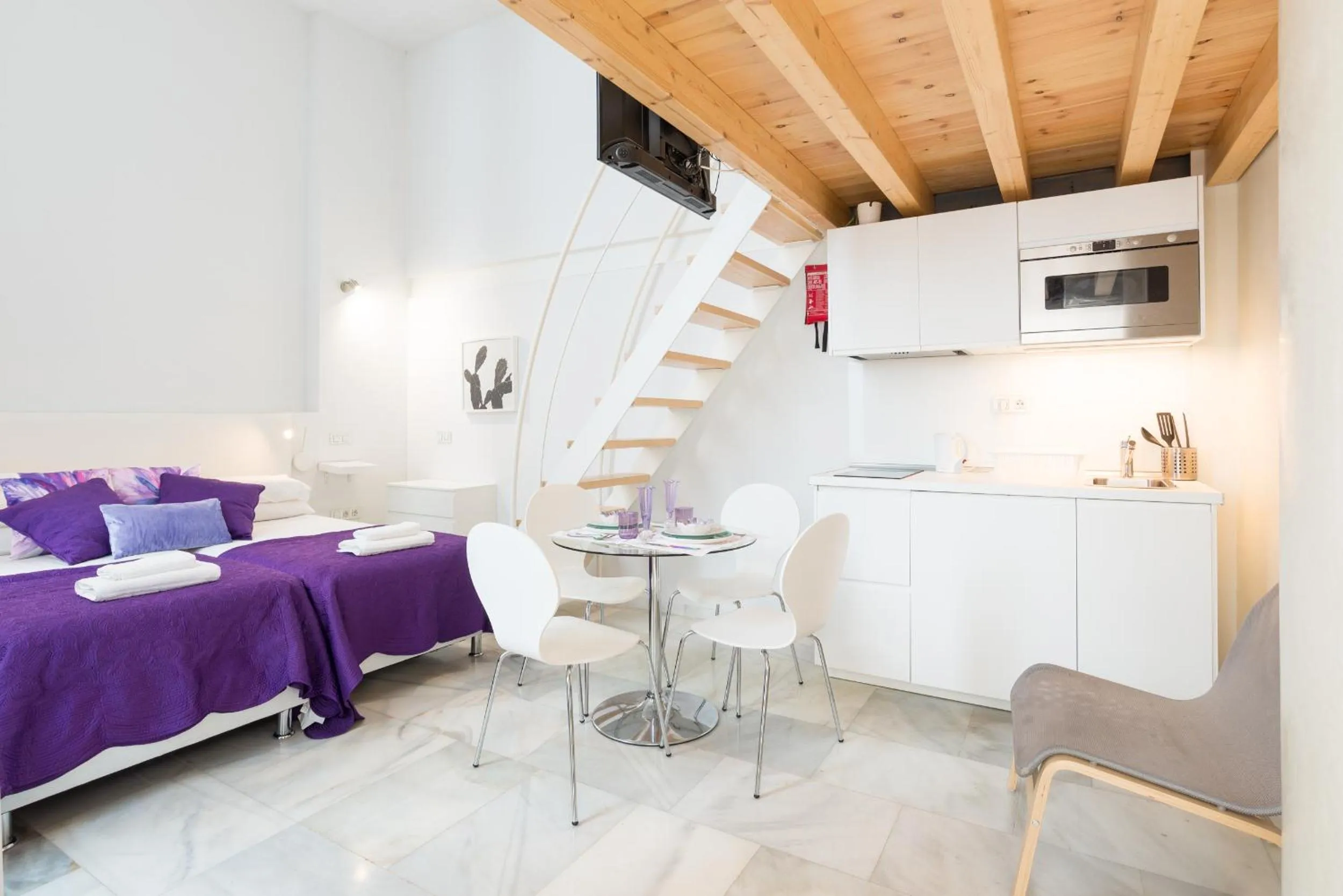 Living room, Bed in Malaga City Breaks