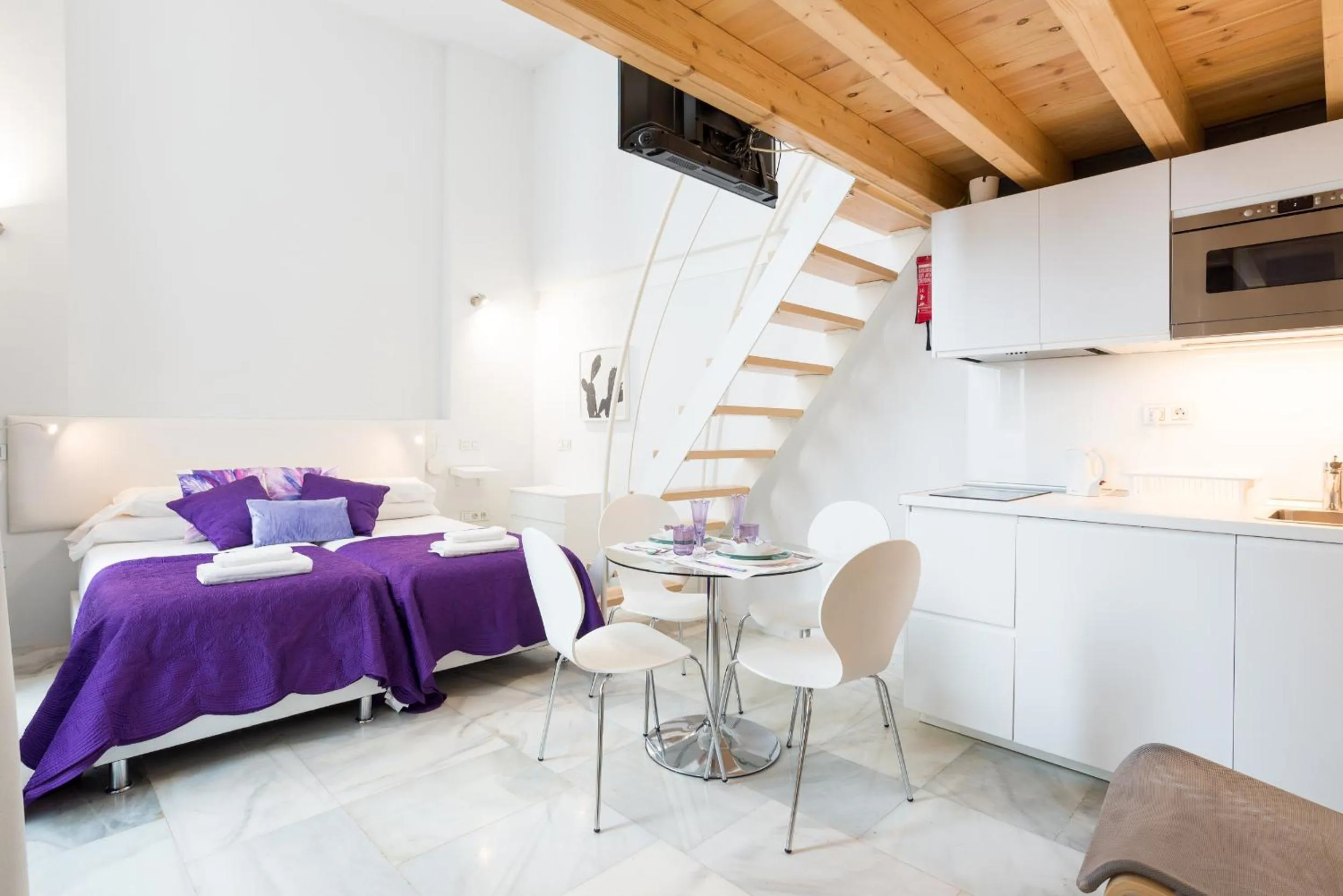 Seating area, Bed in Malaga City Breaks