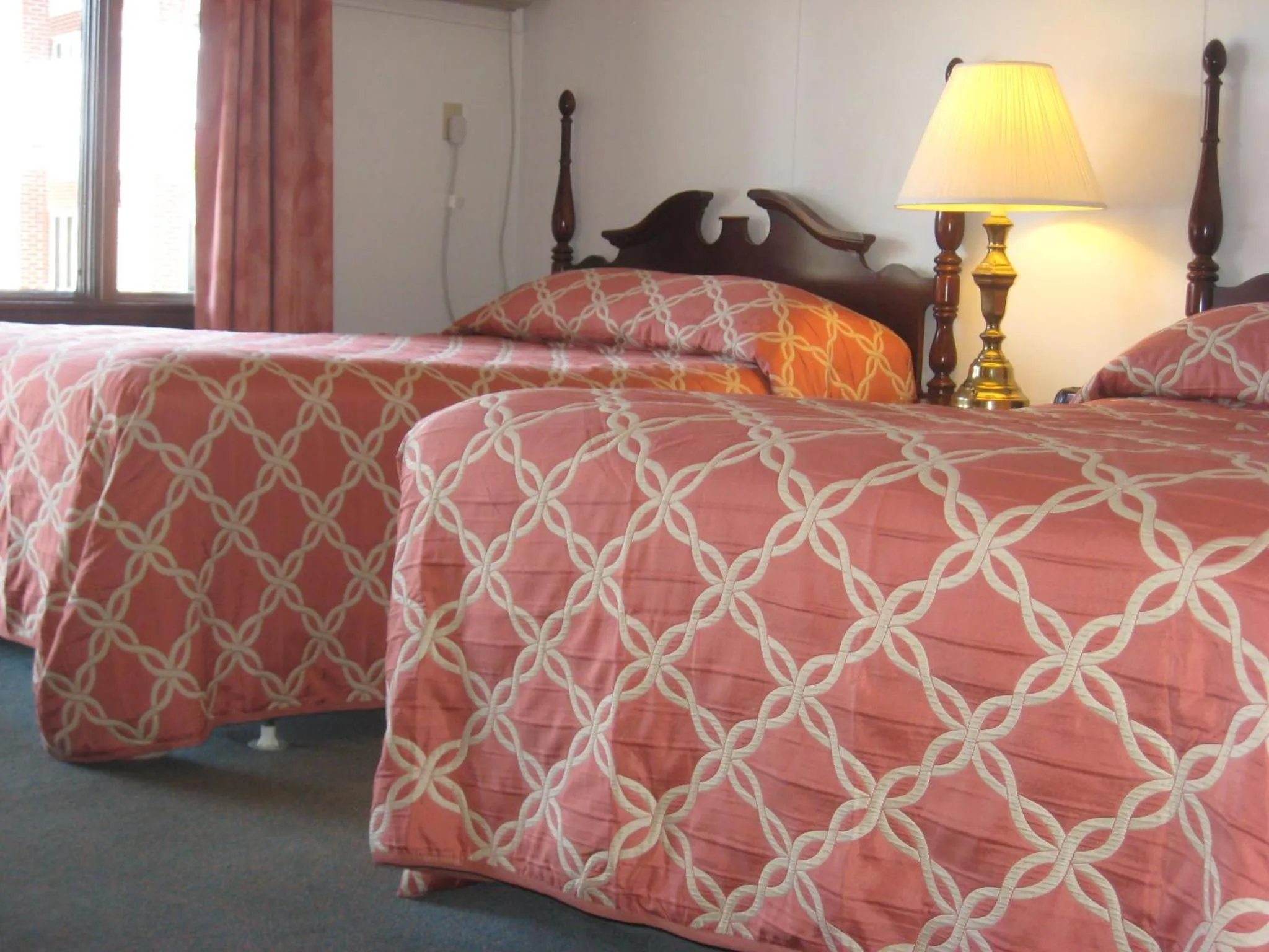 Bed in Lockport Inn and Suites