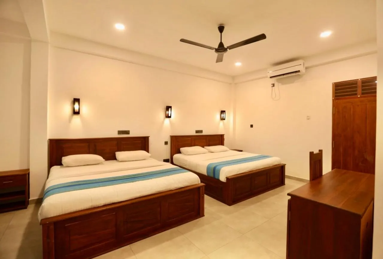 Bed in Wavelength Hotel & Wellness Center