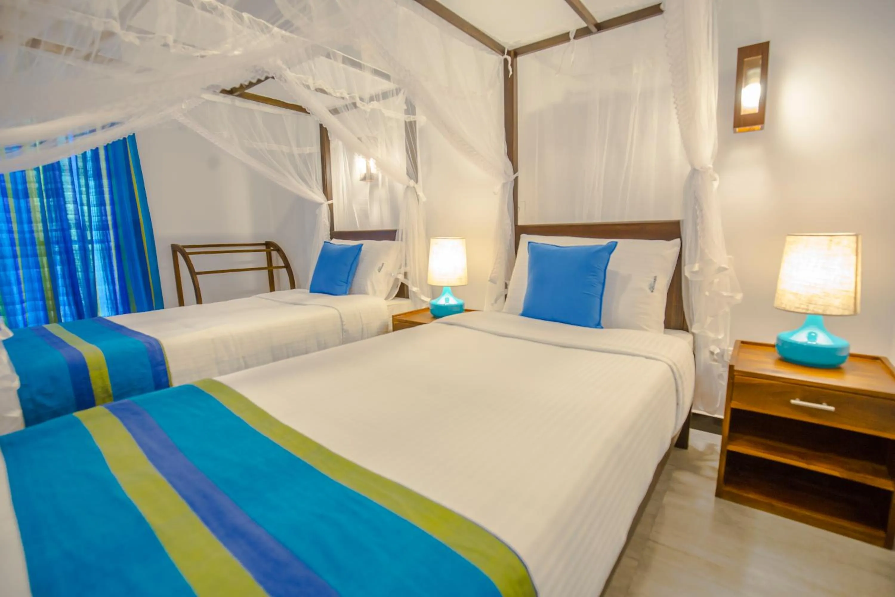 Bed in Wavelength Hotel & Wellness Center