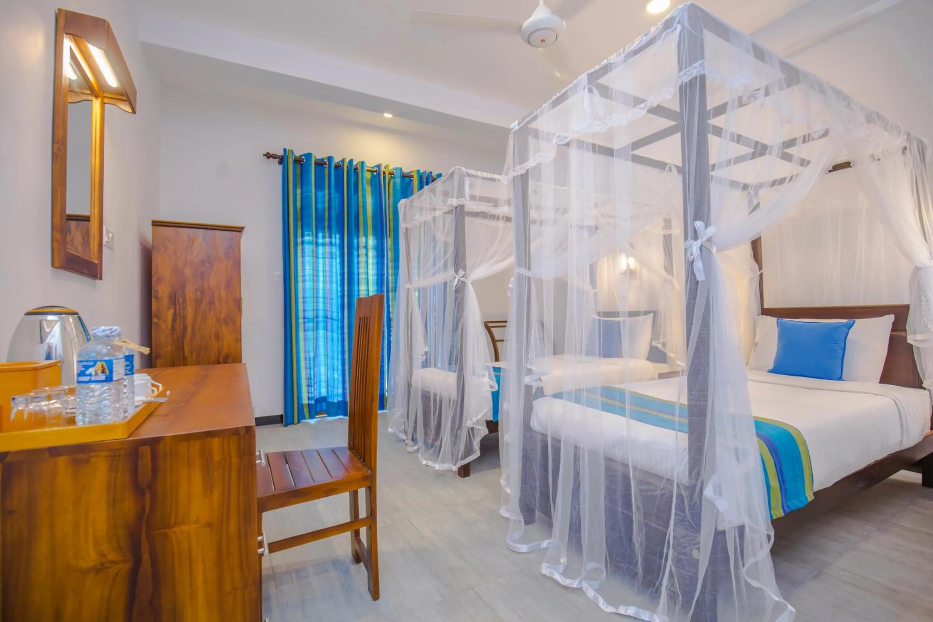 Photo of the whole room, Bed in Wavelength Hotel & Wellness Center