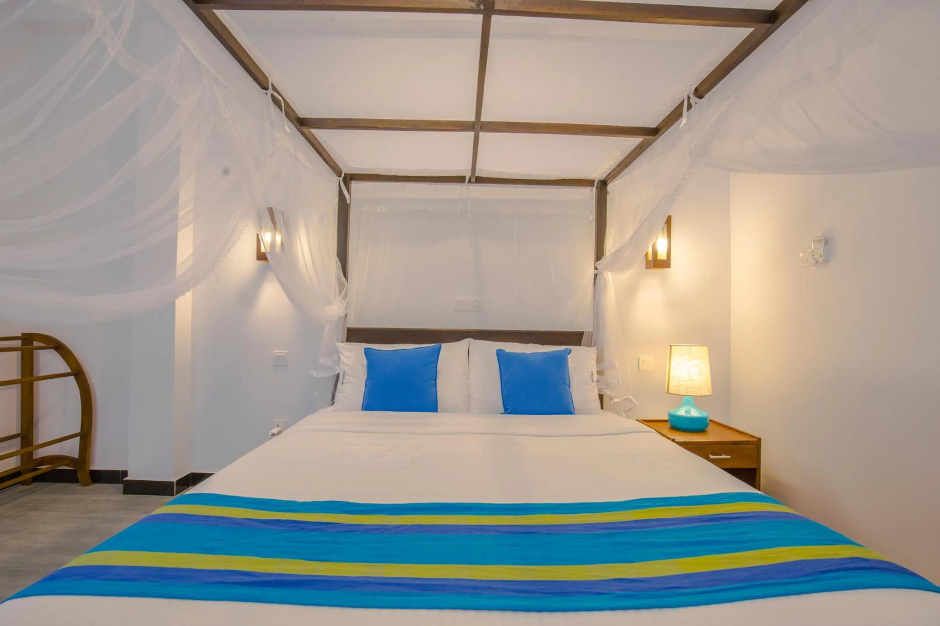 Bed in Wavelength Hotel & Wellness Center