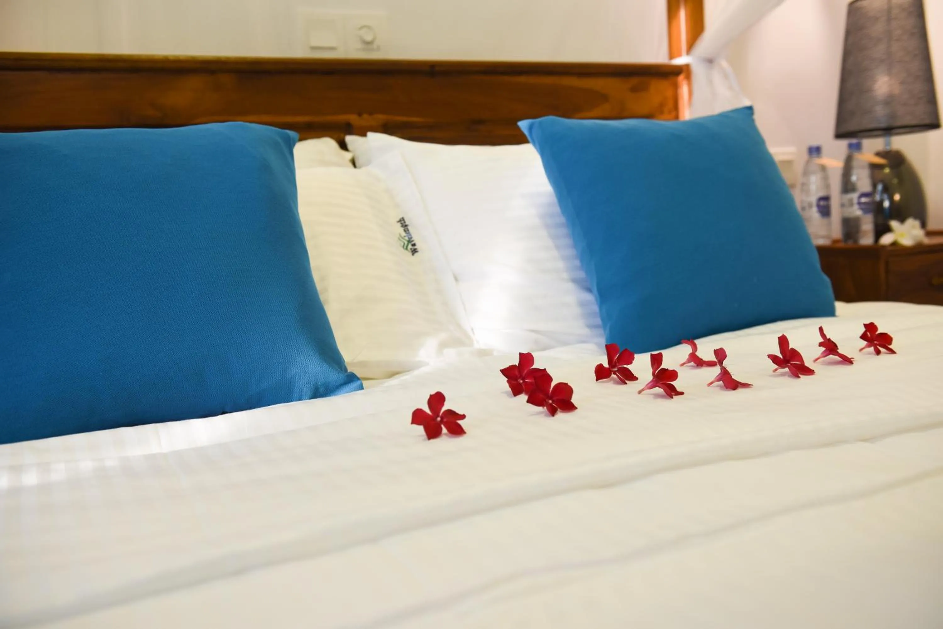 Bed in Wavelength Hotel & Wellness Center