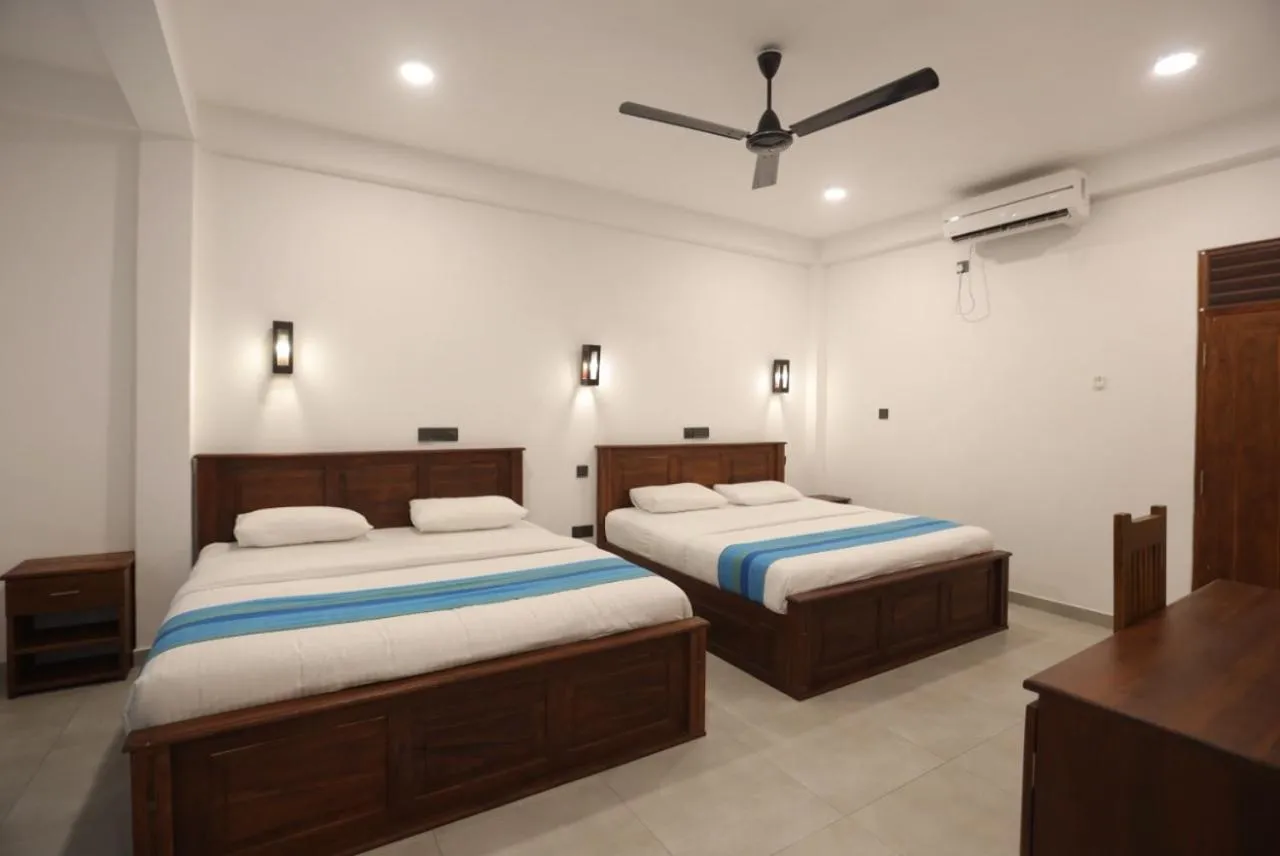 Bed in Wavelength Hotel & Wellness Center