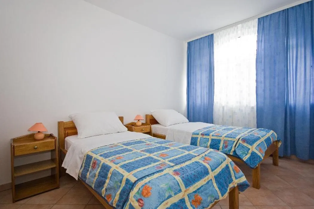 Bed in Apartments Valentino