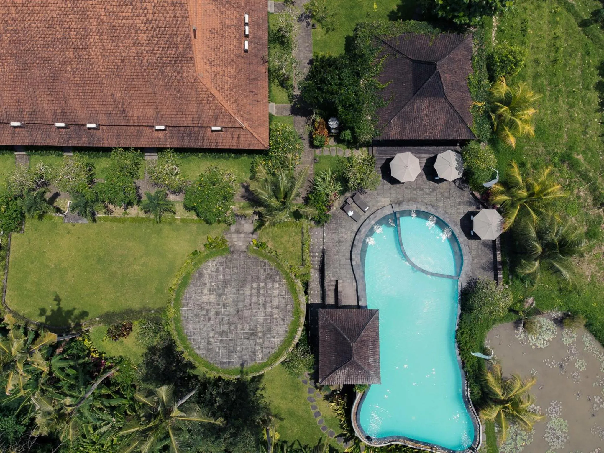 Swimming pool in Uma Dawa Resort and Spa