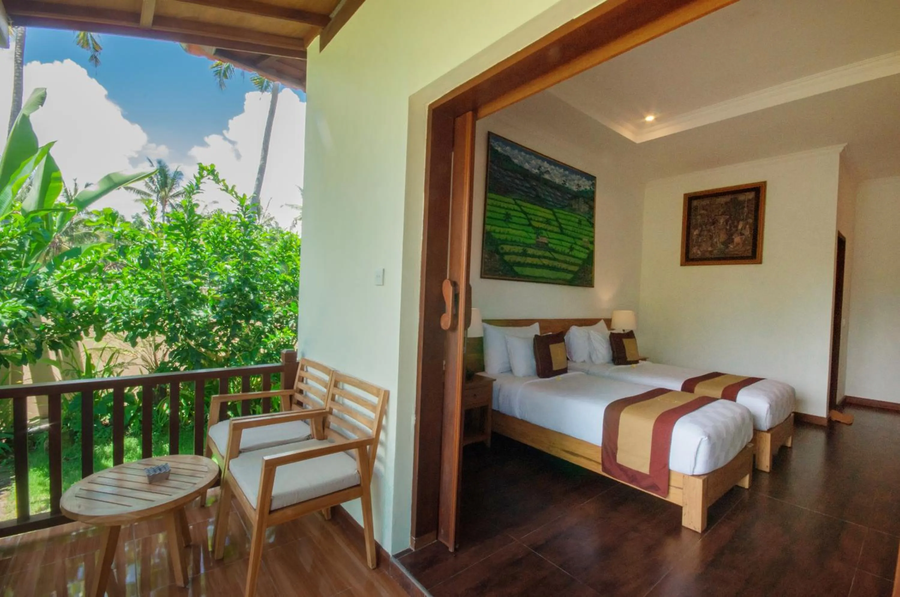 Bed in Uma Dawa Resort and Spa