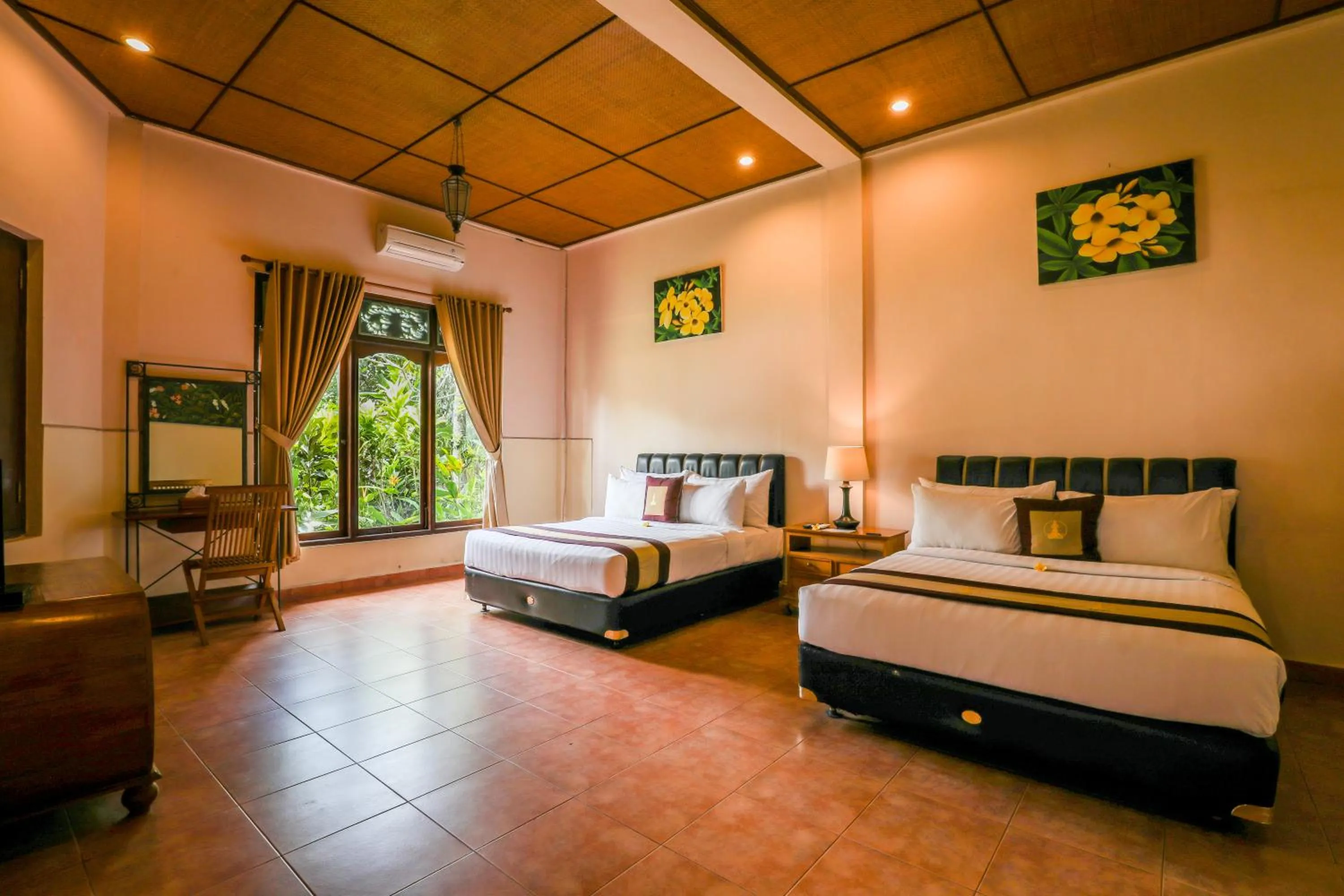 Bed in Uma Dawa Resort and Spa
