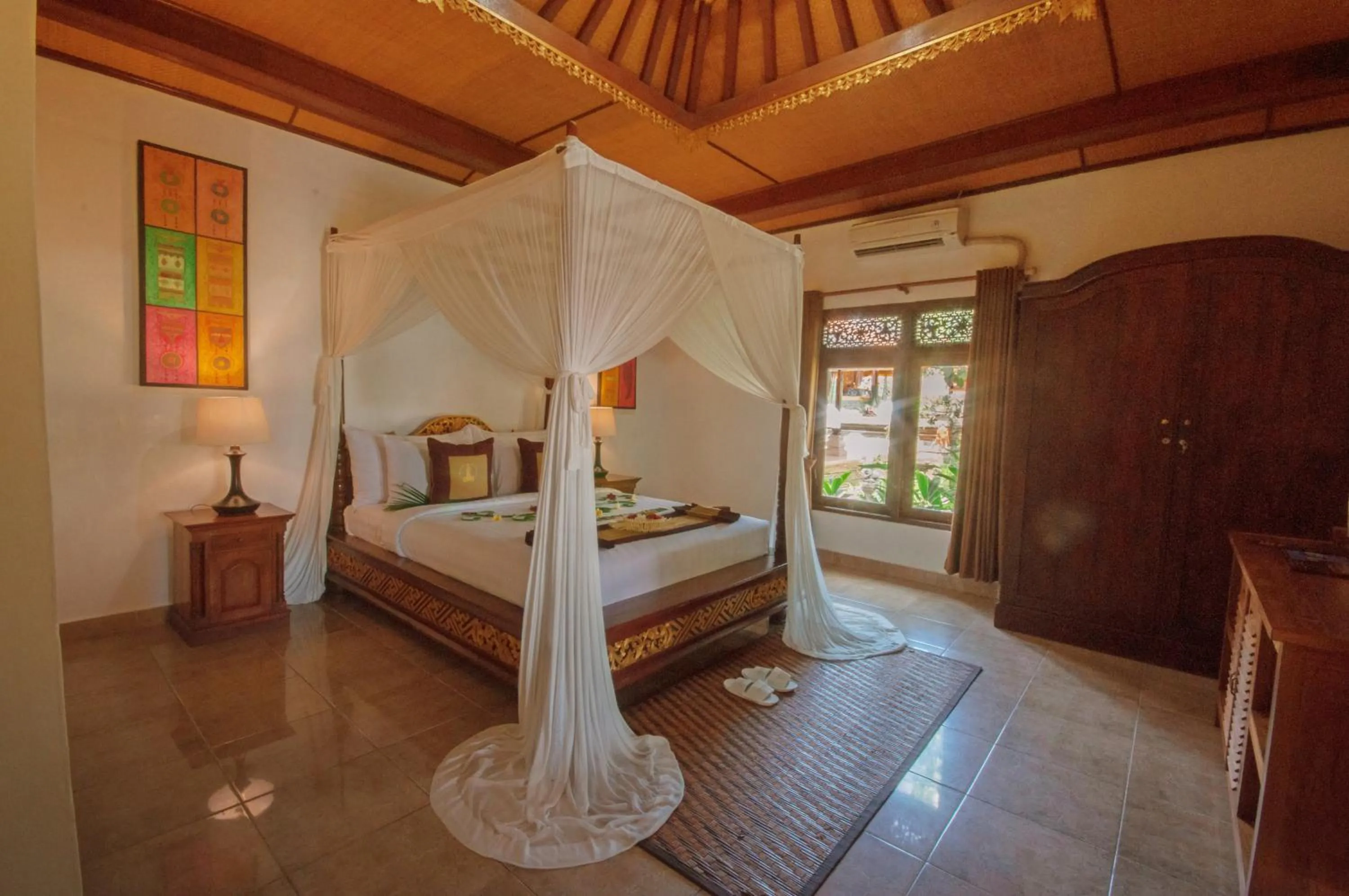 Bed in Uma Dawa Resort and Spa