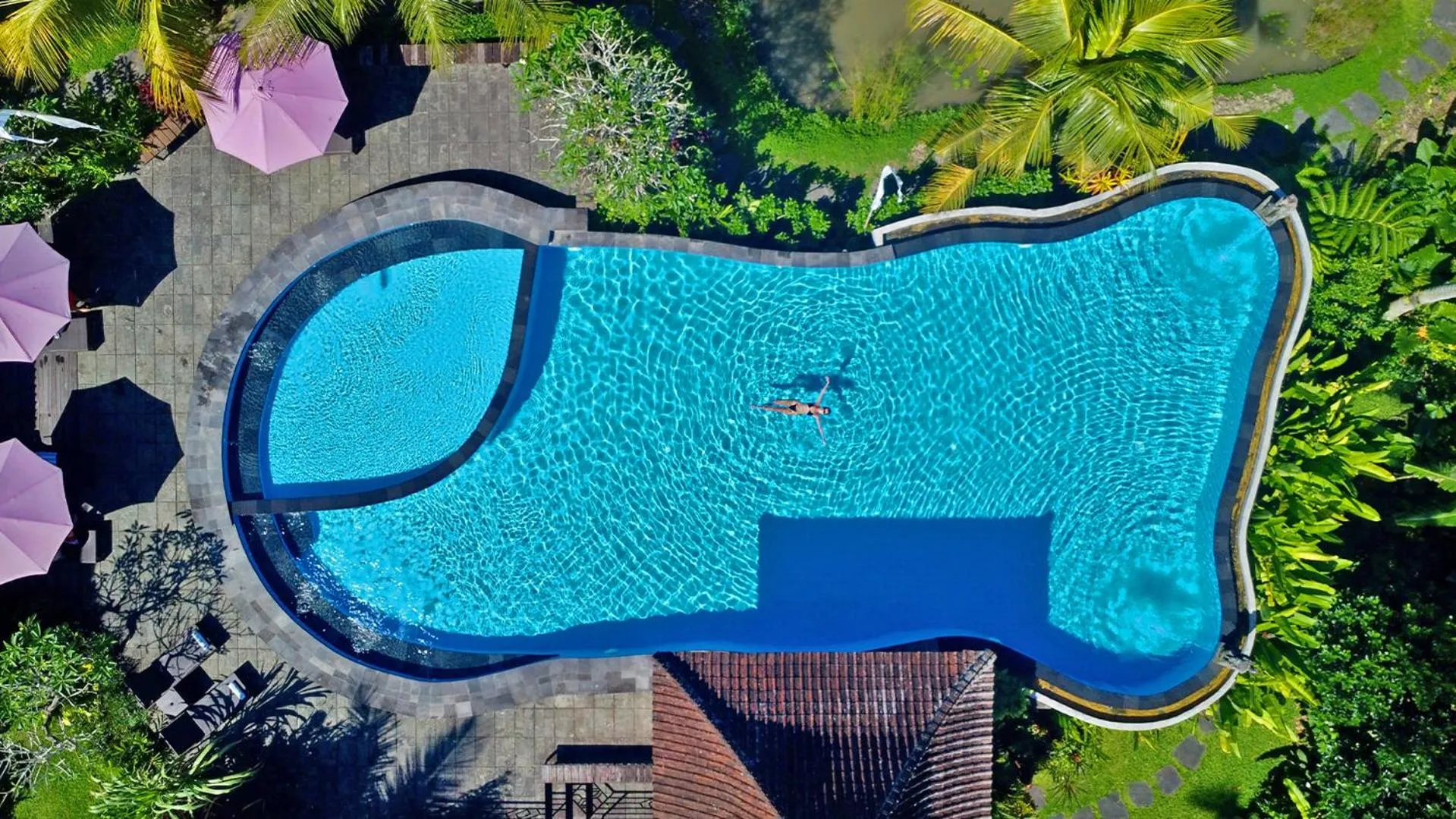 Swimming pool in Uma Dawa Resort and Spa