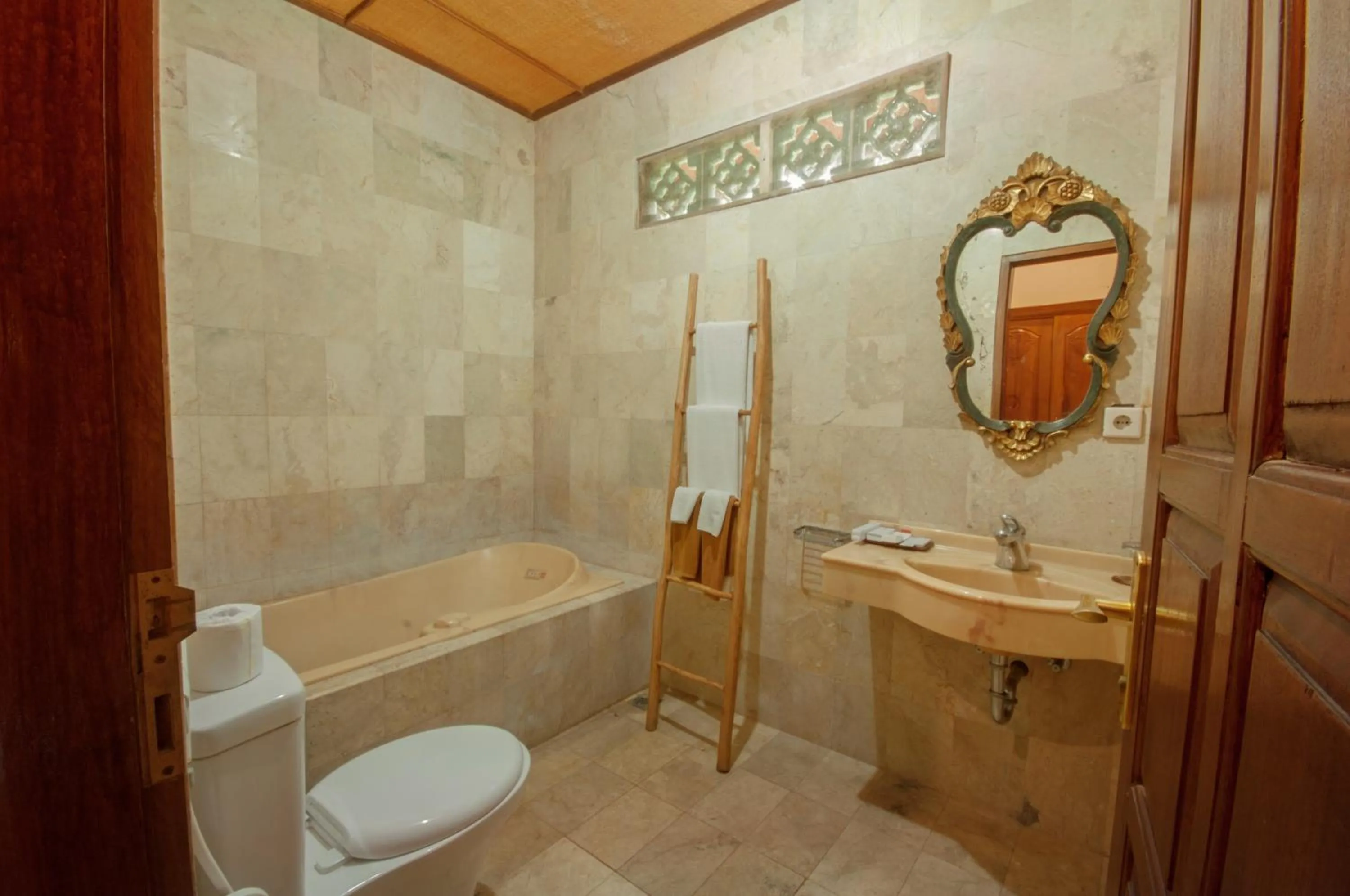 Toilet in Uma Dawa Resort and Spa