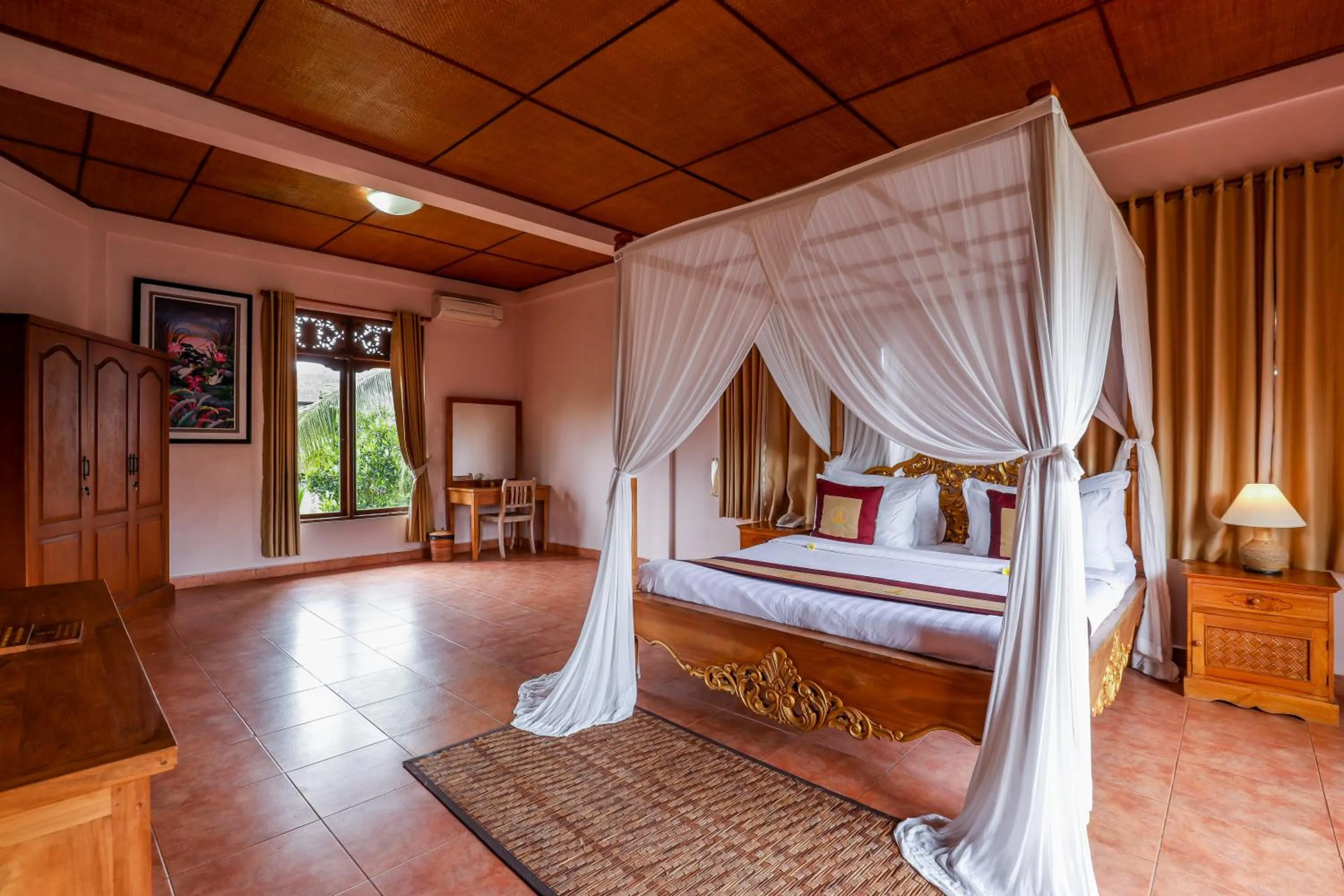 Bed in Uma Dawa Resort and Spa