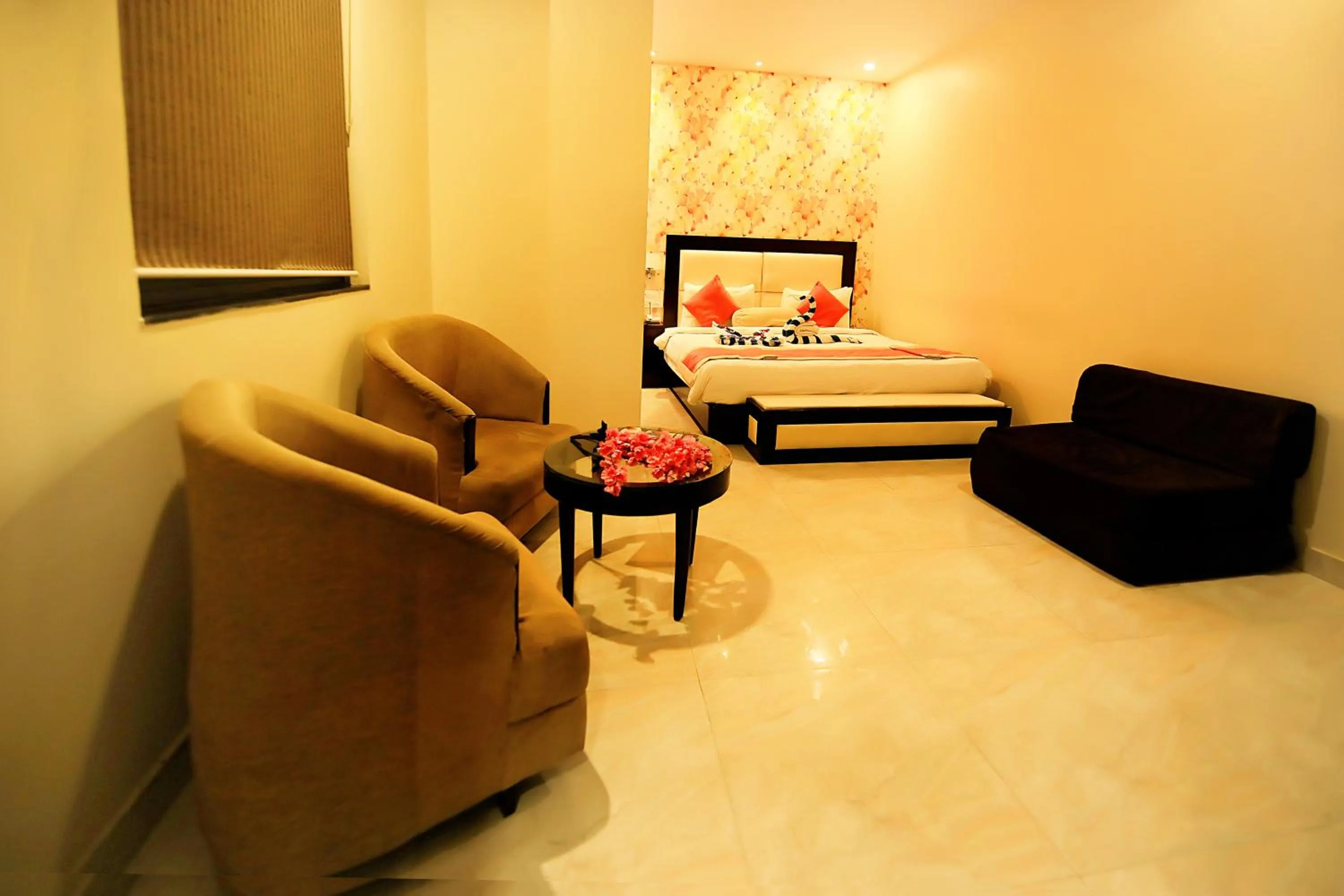 Photo of the whole room, Bed in V One Pride