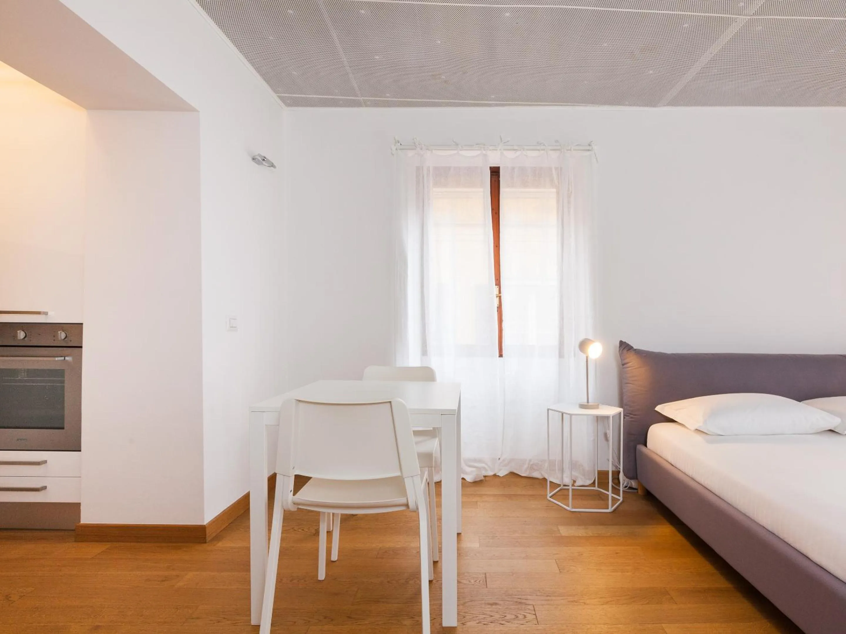 Photo of the whole room, Bed in easyhomes - Spiga Suite