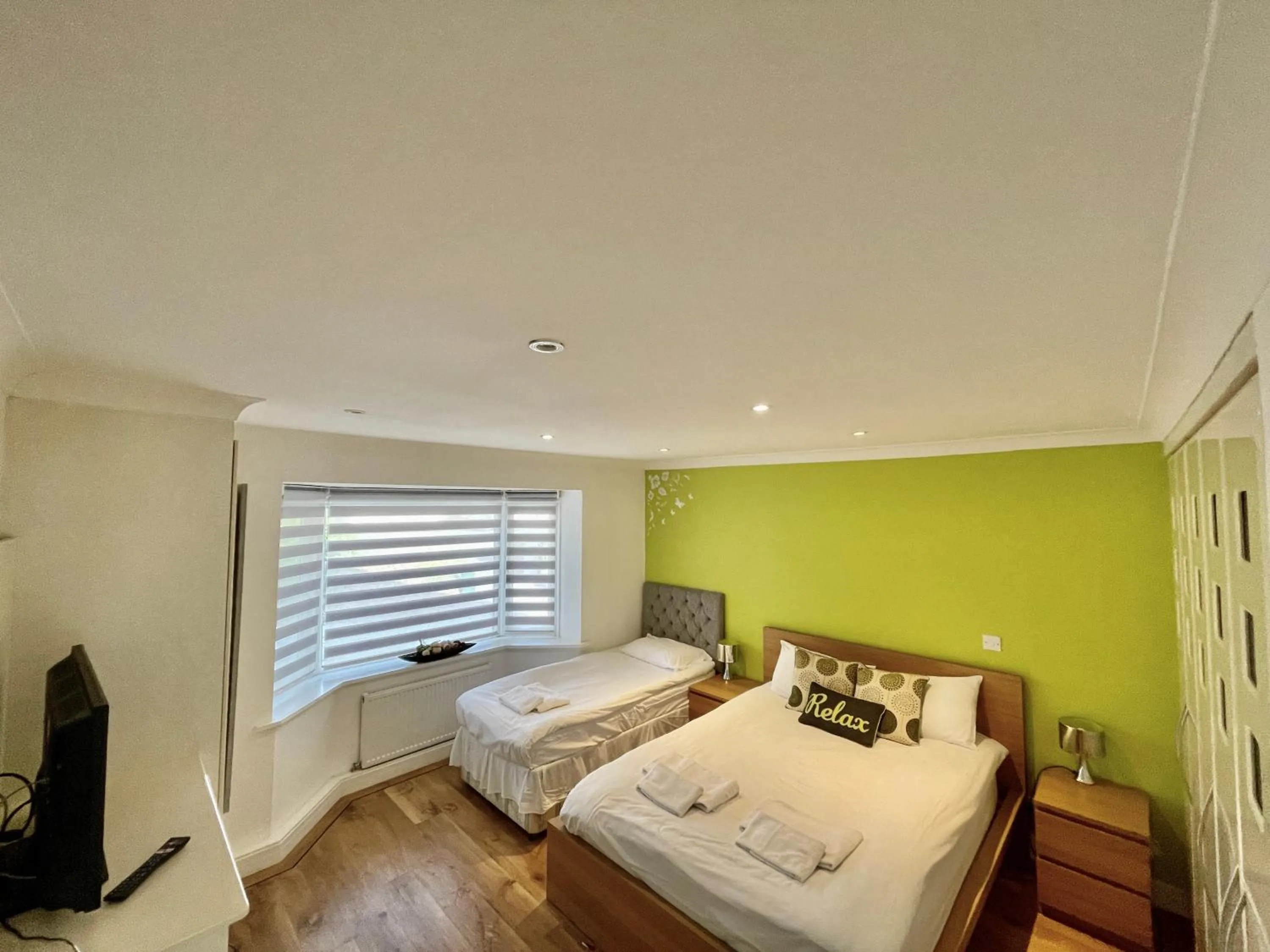 Bed in Four Corners Holiday Home Hot Tub & Sauna