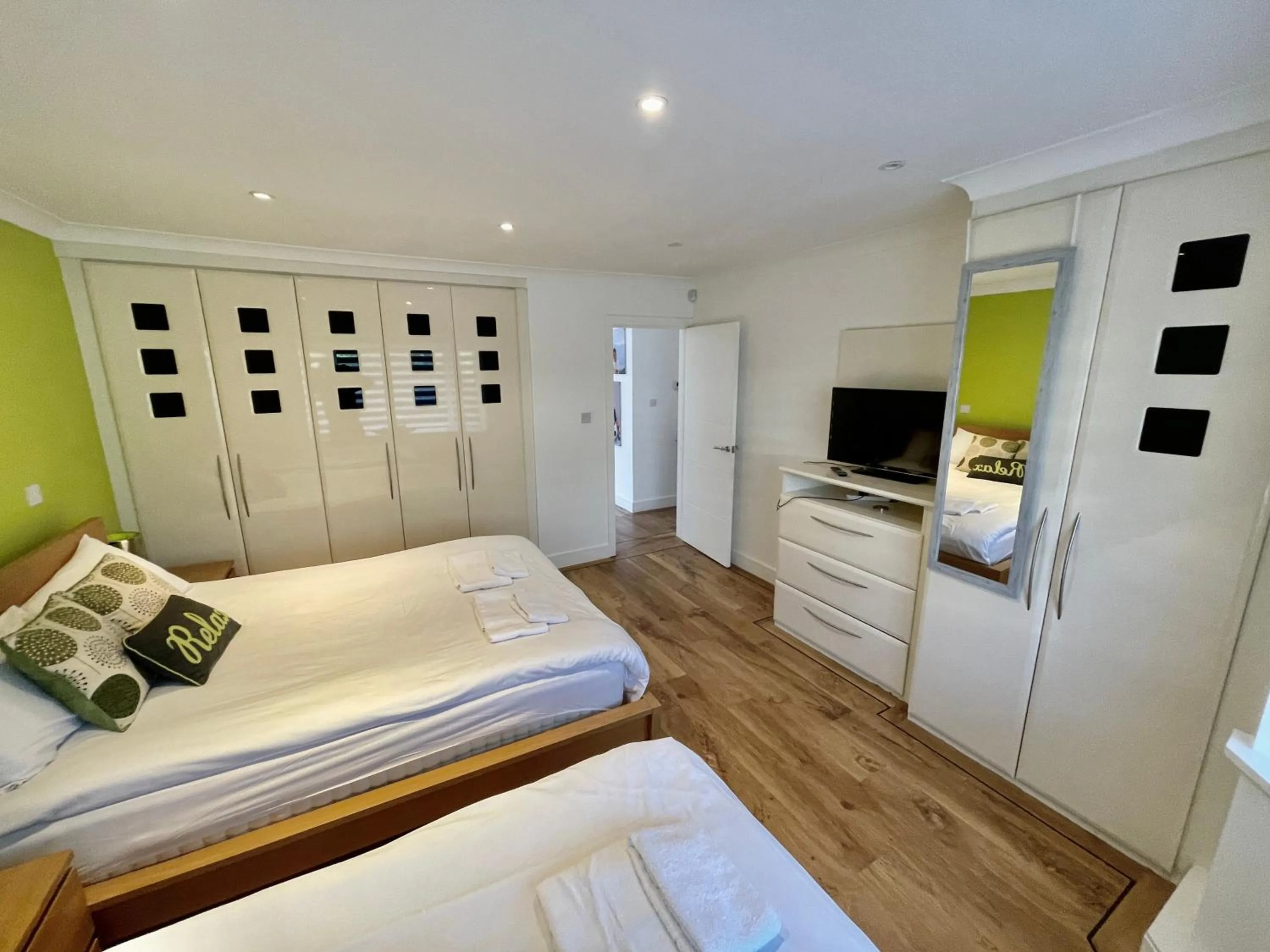 Bed in Four Corners Holiday Home Hot Tub & Sauna