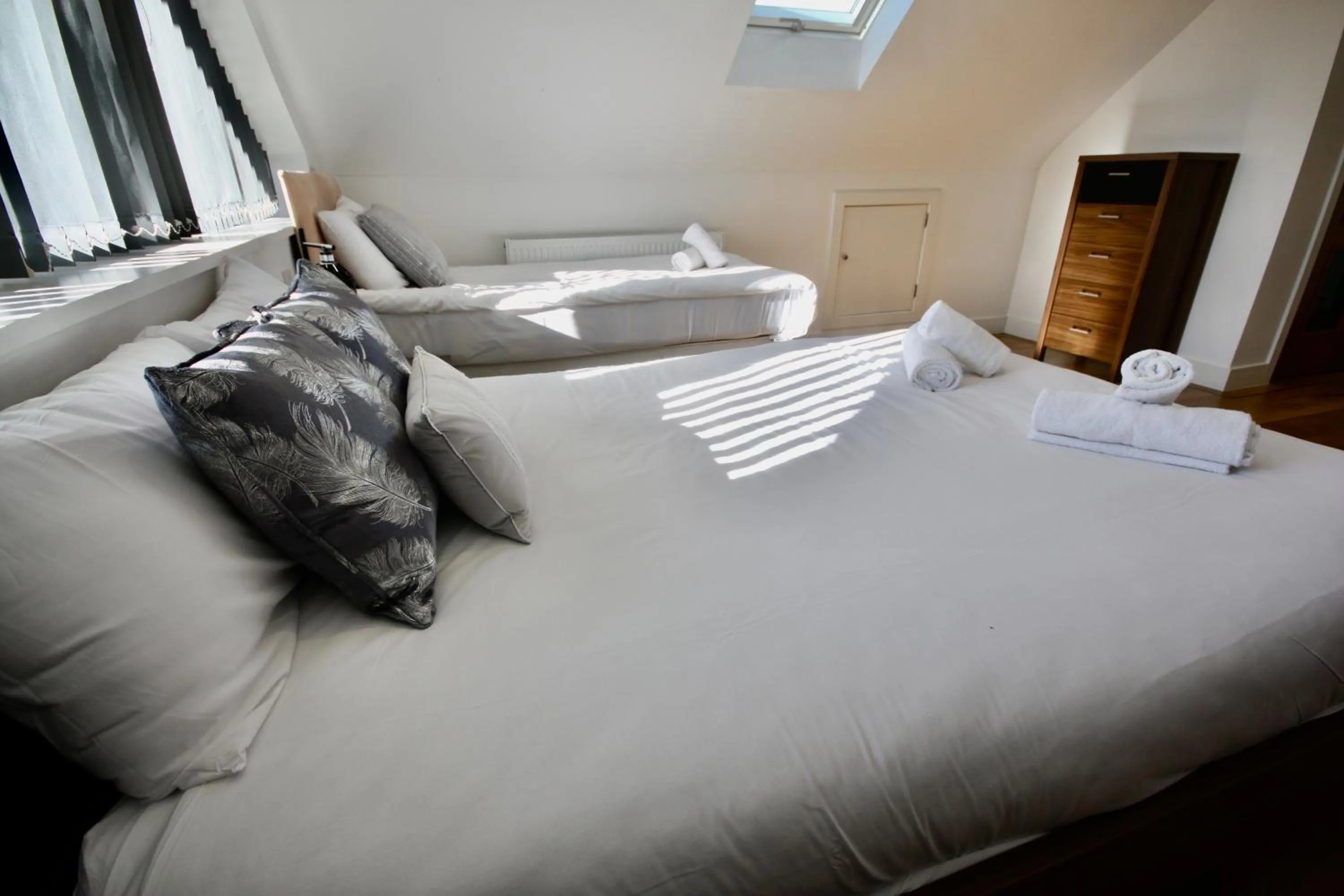 Bed in Four Corners Holiday Home Hot Tub & Sauna