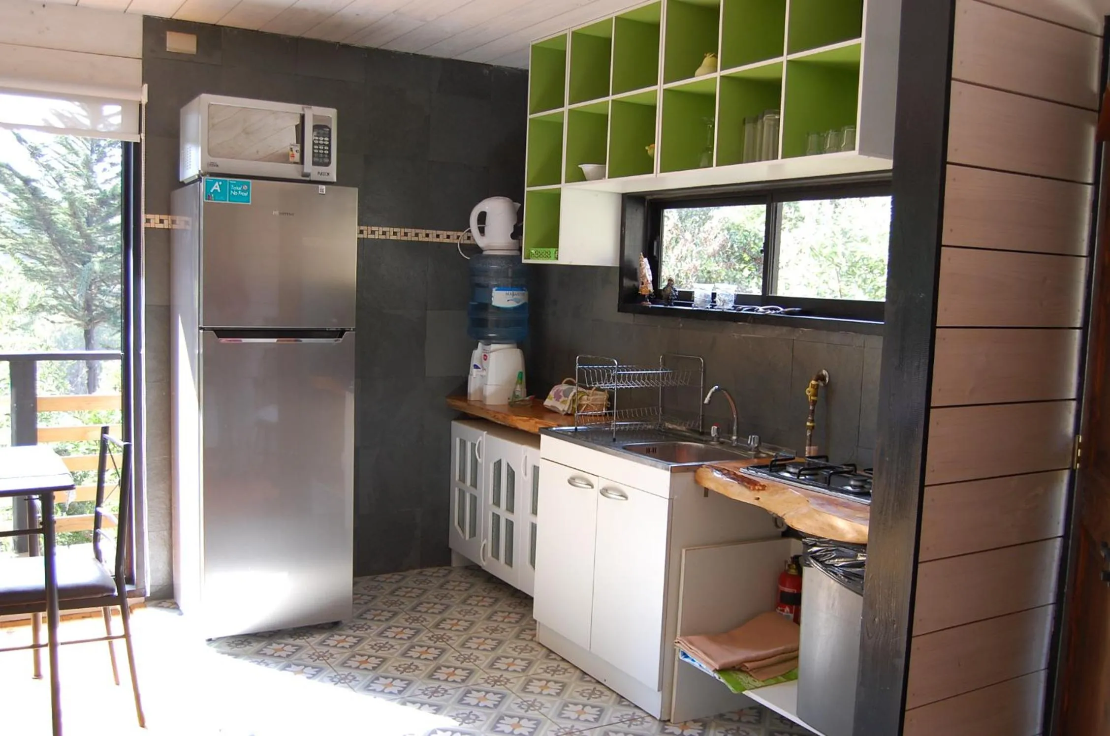 Kitchen or kitchenette in Cabaña del Bosque