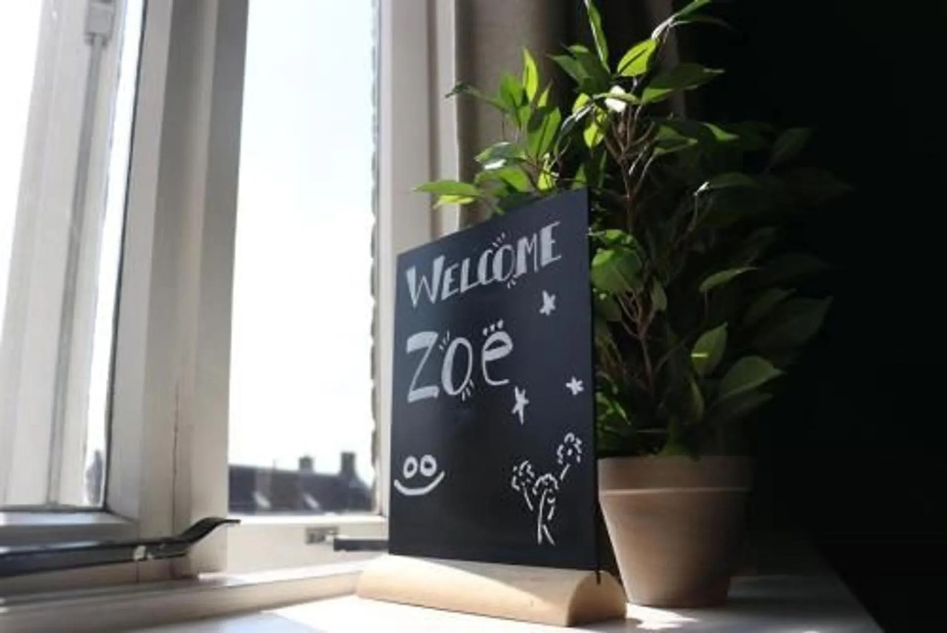 Property logo or sign in Hostel Roots