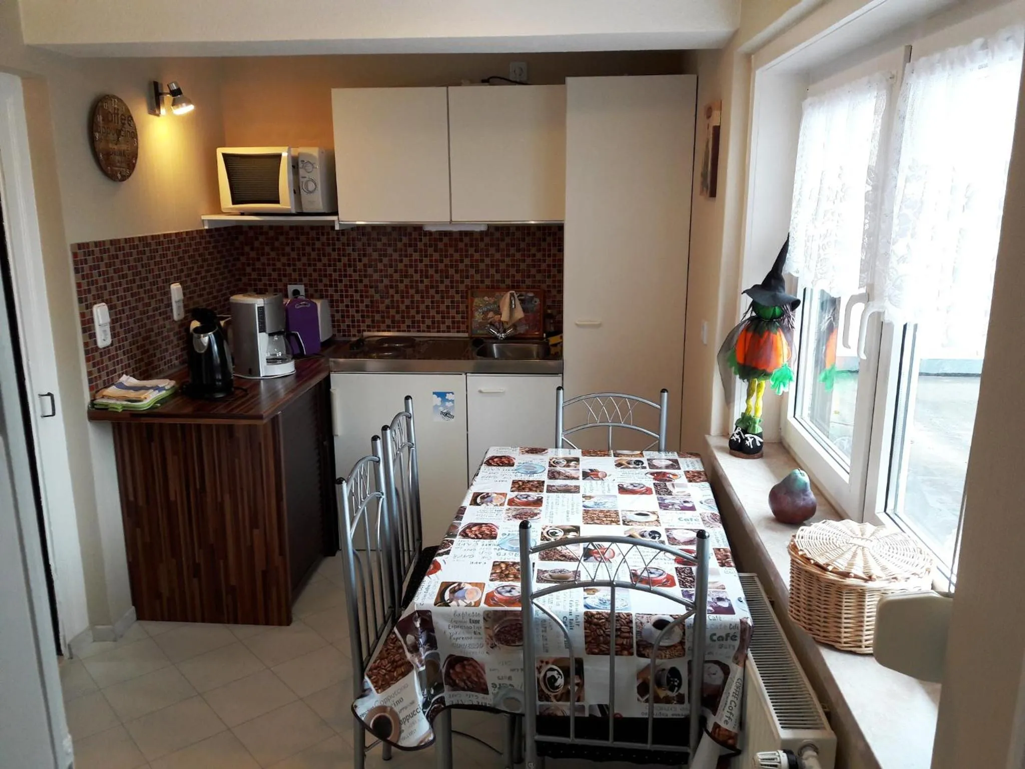 Kitchen or kitchenette, Bed in Ferienwohnung Osterbrink