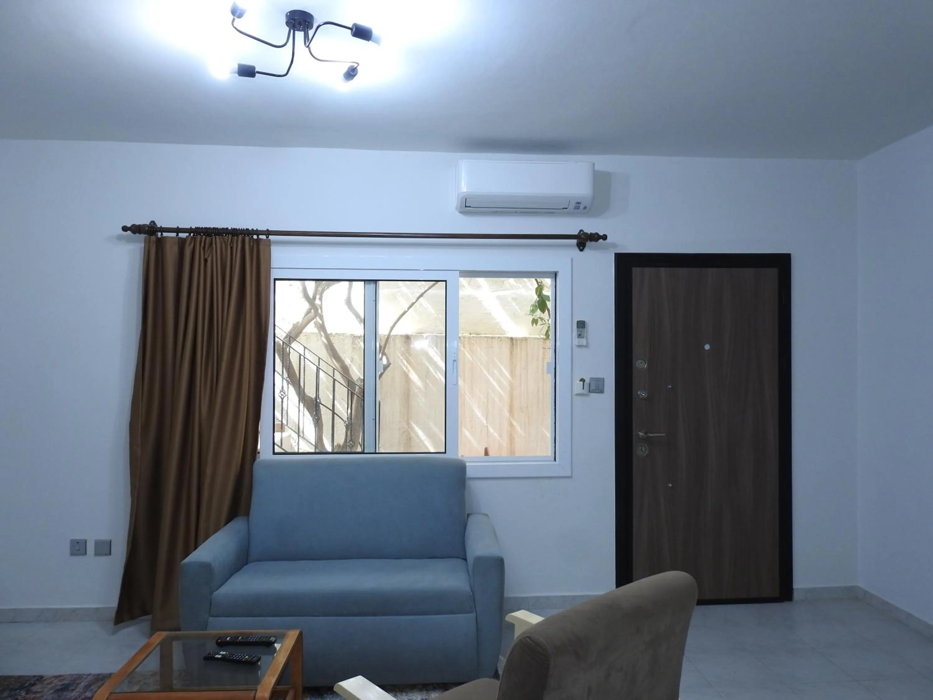 Living room in Ertunalp Apartment