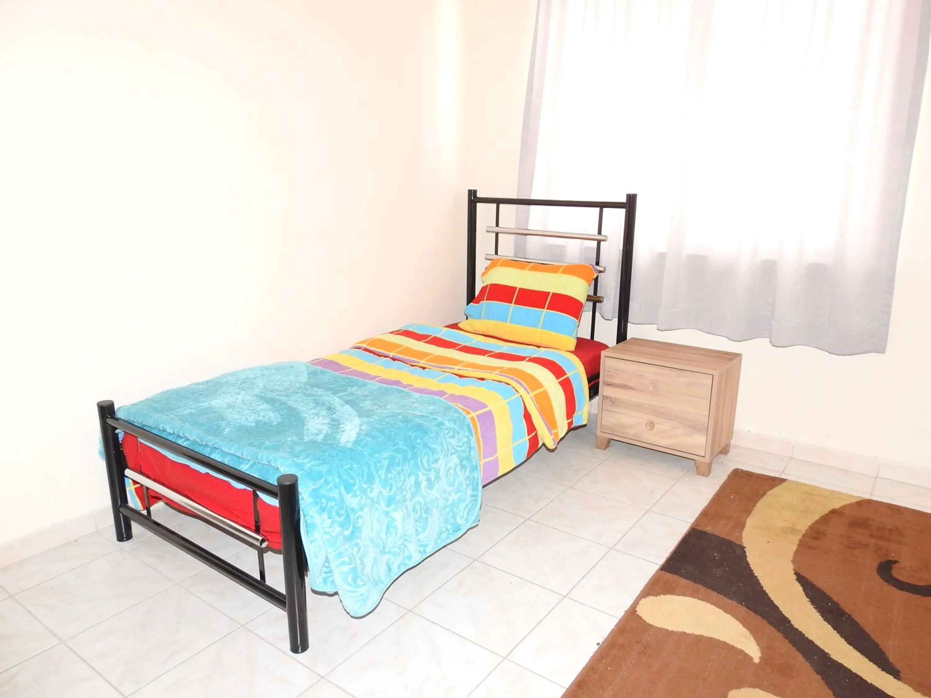 Bed in Ertunalp Apartment