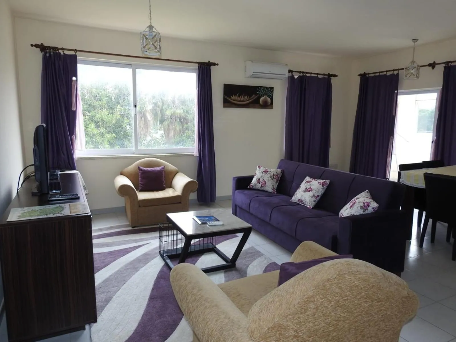 Living room in Ertunalp Apartment