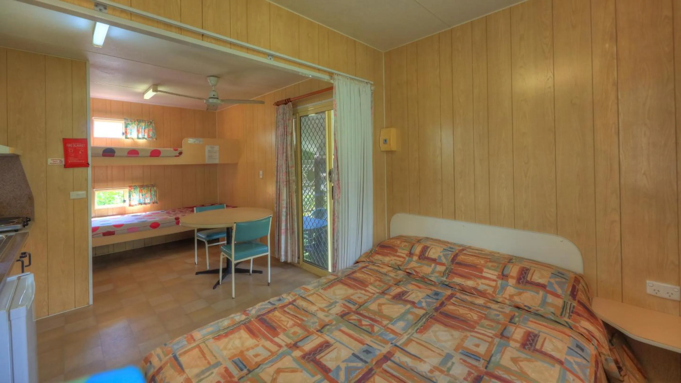 Living room, Bed in Flying Fish Point Tourist Park