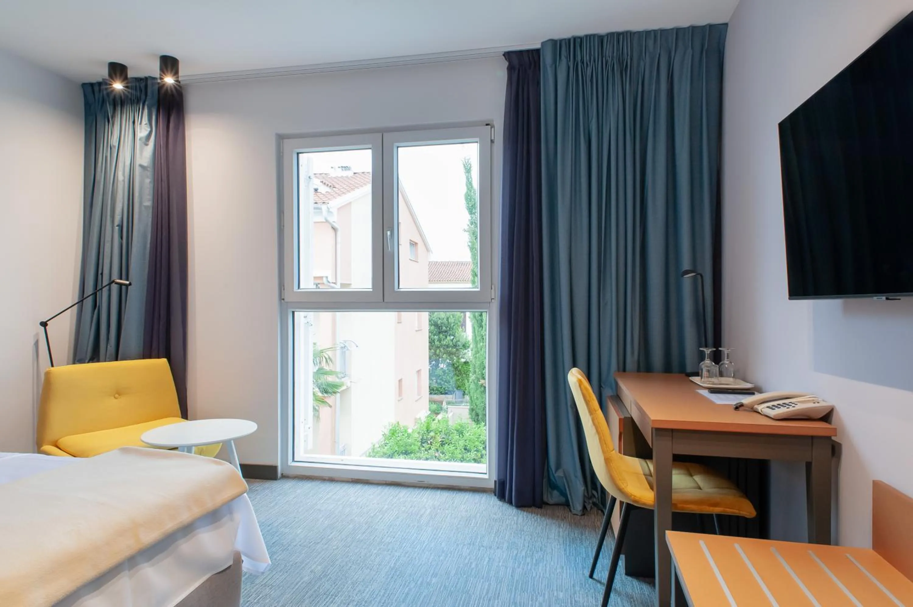 Seating area, Bed in Boutique hotel Lili