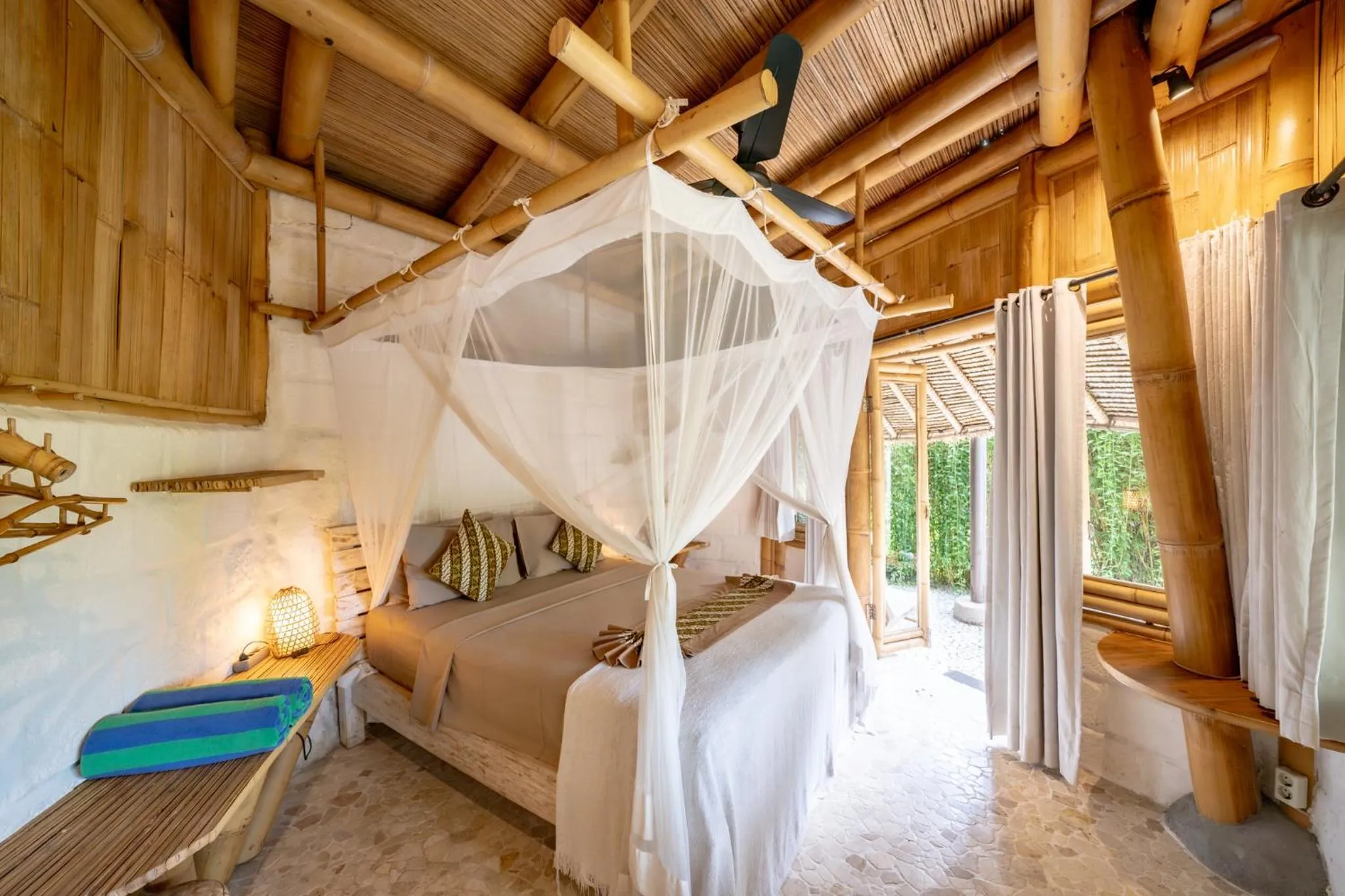 Bed in Le Bamboo Bali