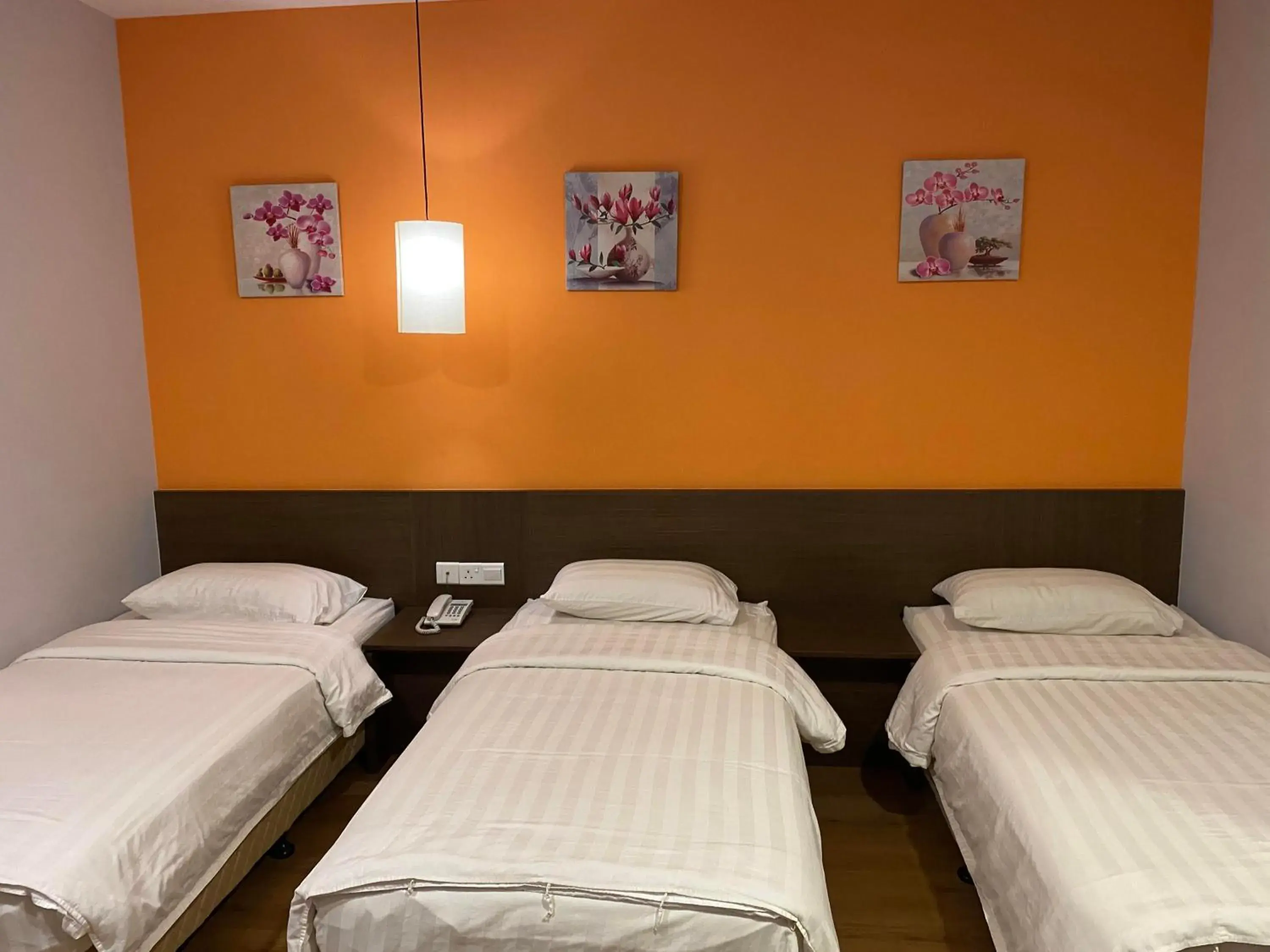 Bed in GPI HOTEL Bentong Bed in GPI HOTEL Bentong