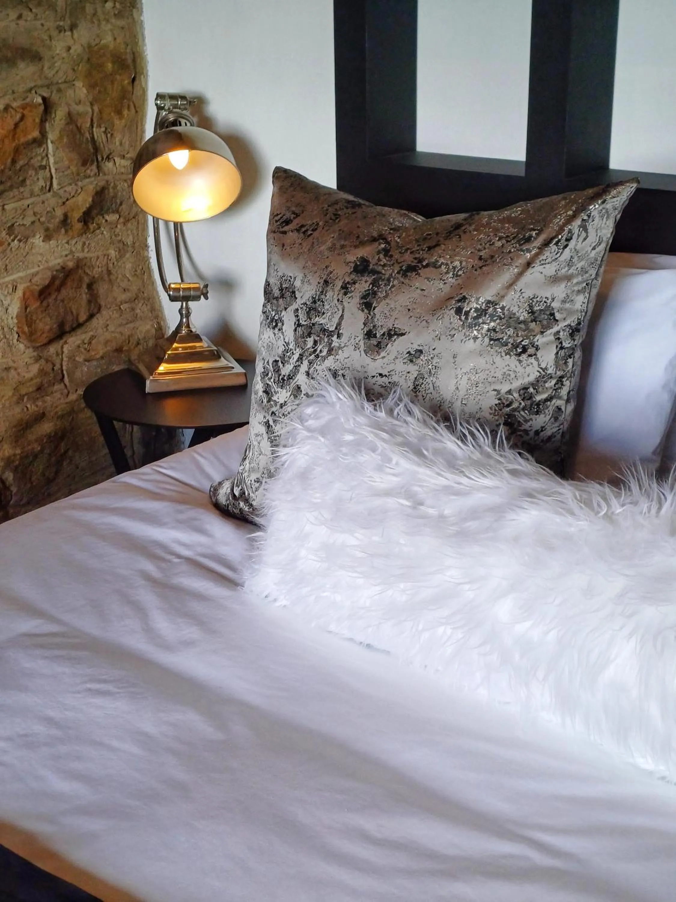 Bed in Affi lande Boetiek guestfarm