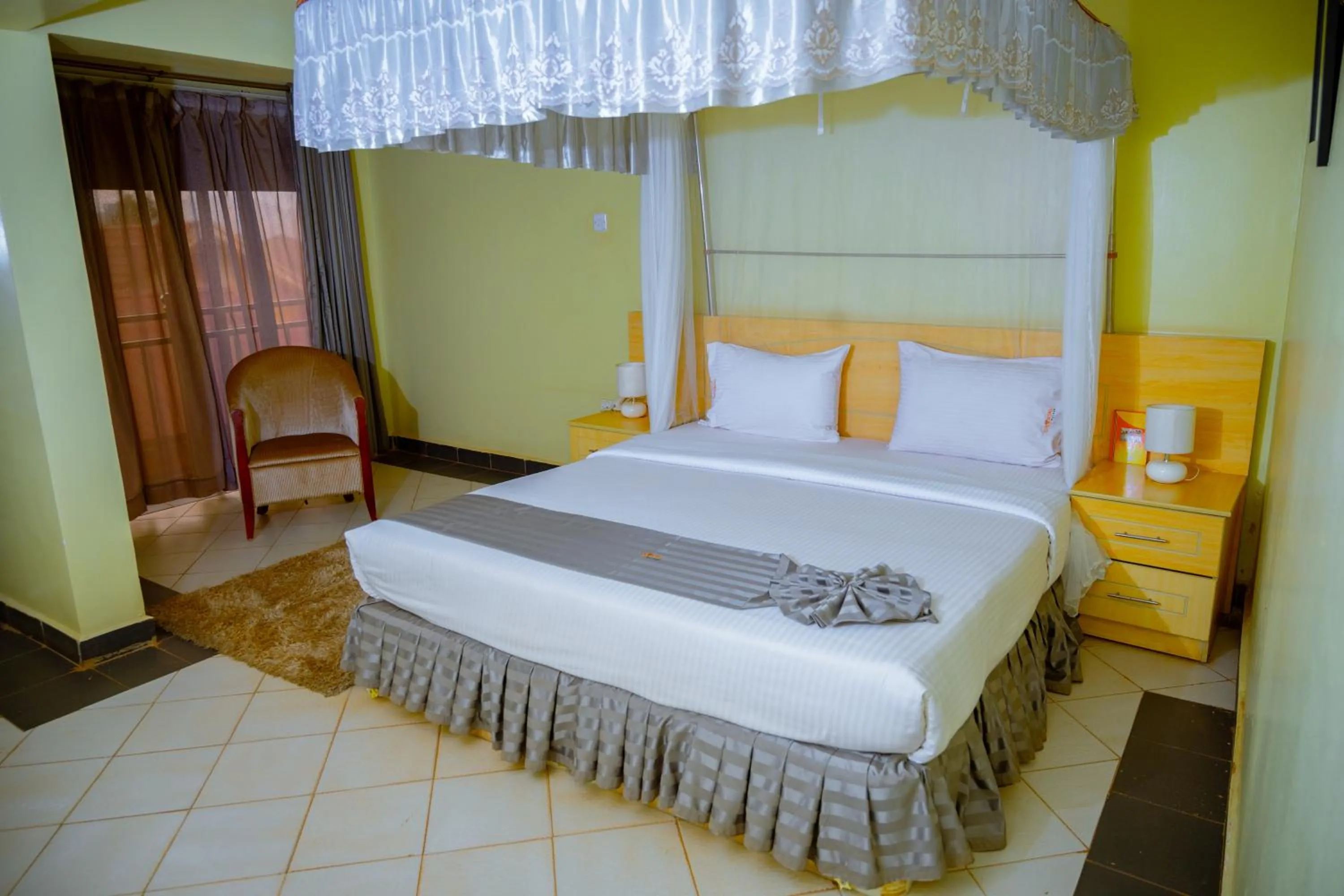 Bedroom, Bed in Crystal Suites & Apartments