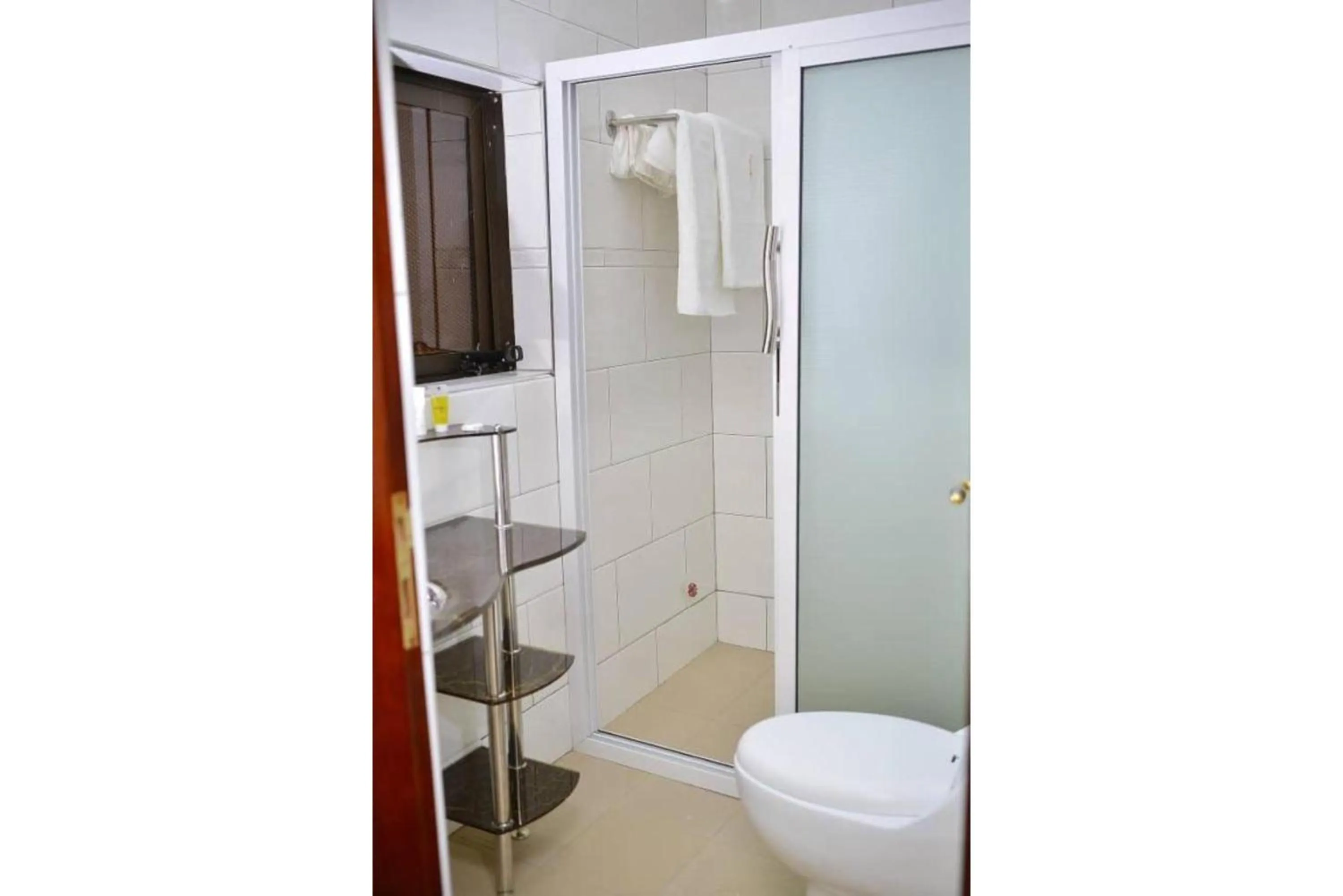 Toilet in Crystal Suites & Apartments