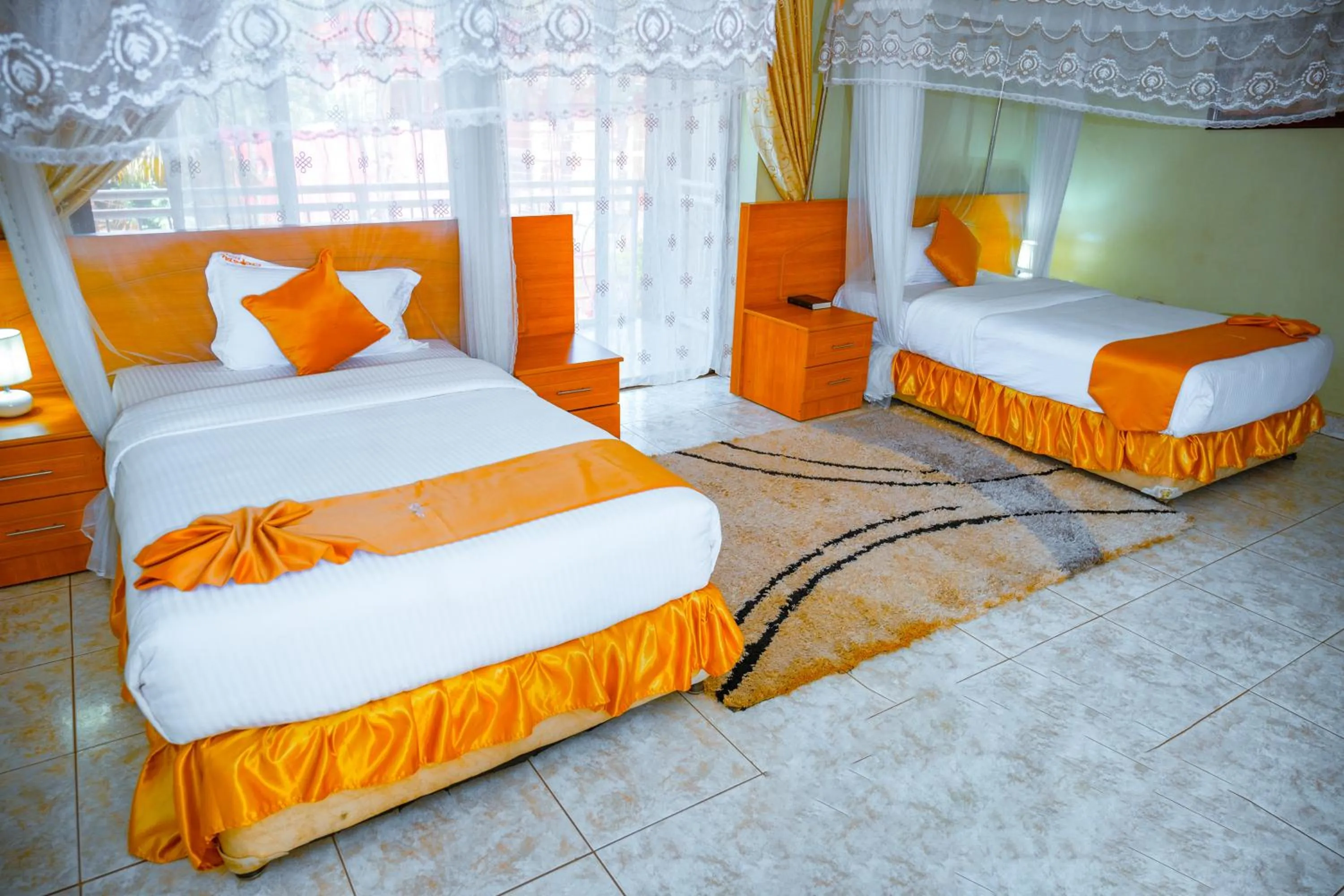 Bed in Crystal Suites & Apartments