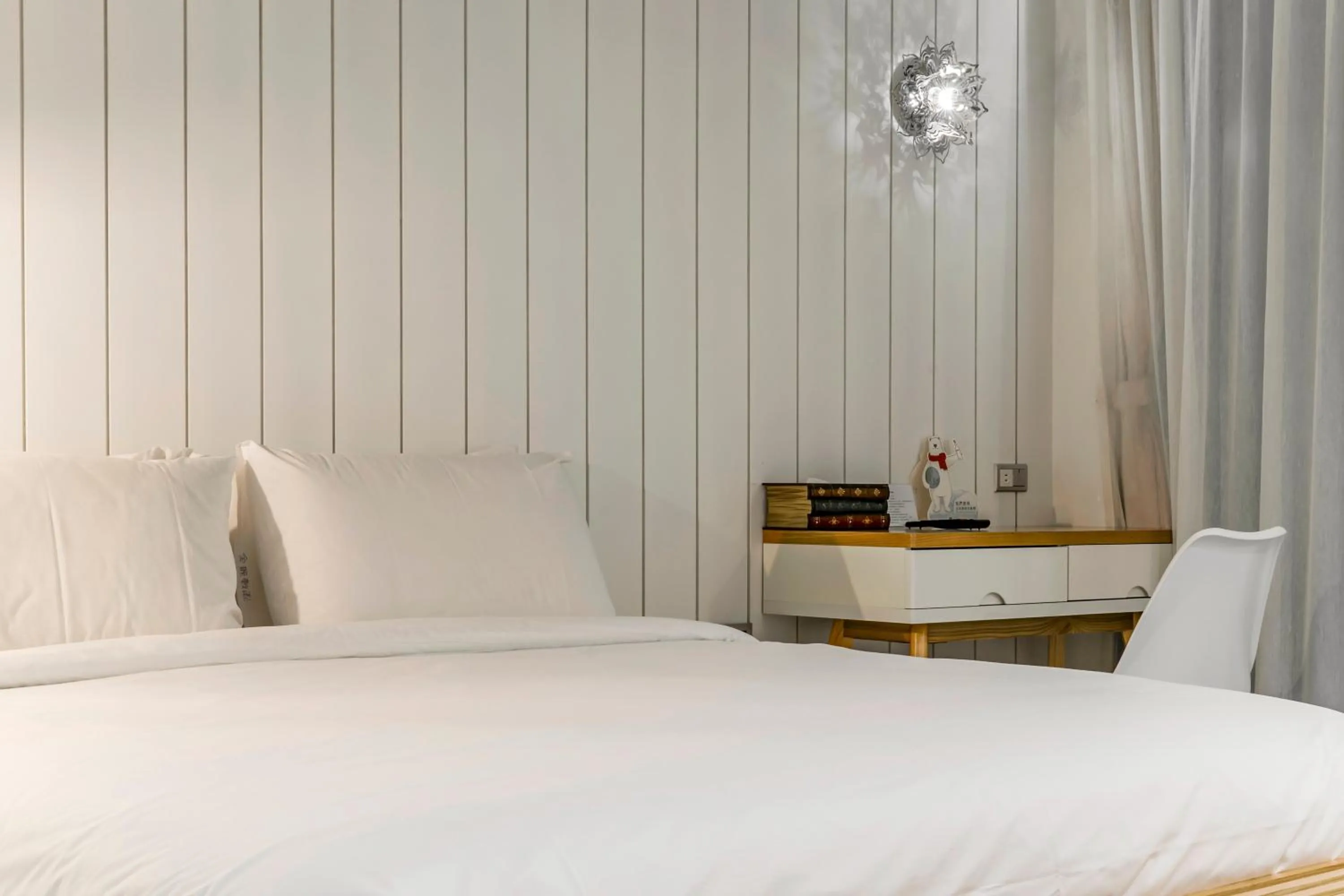 Bed in Han Yan Design Hotel