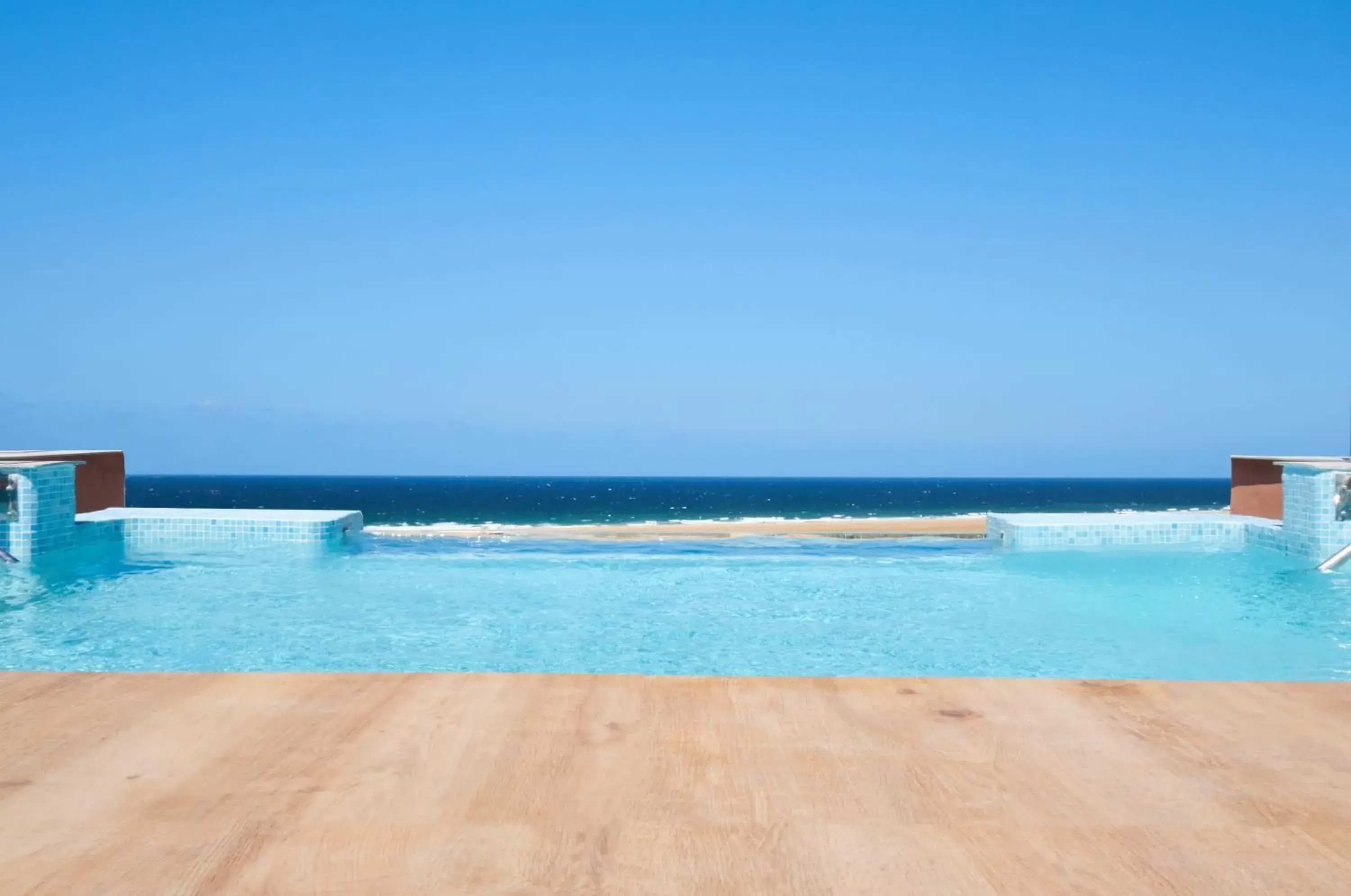 Pool view in Tarifa Lances by QHotels Pool view in Tarifa Lances by QHotels