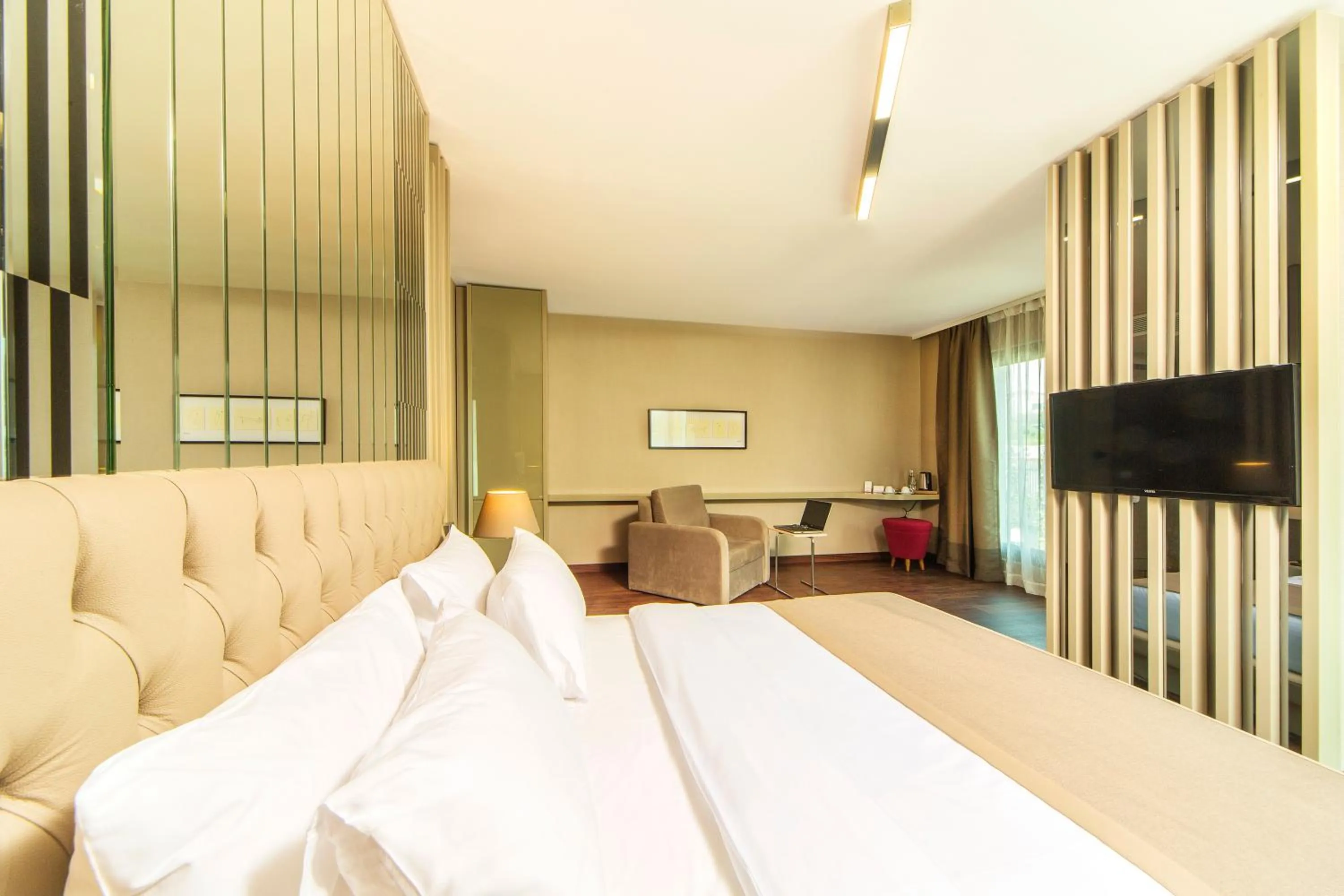 Photo of the whole room, Bed in The City Suites