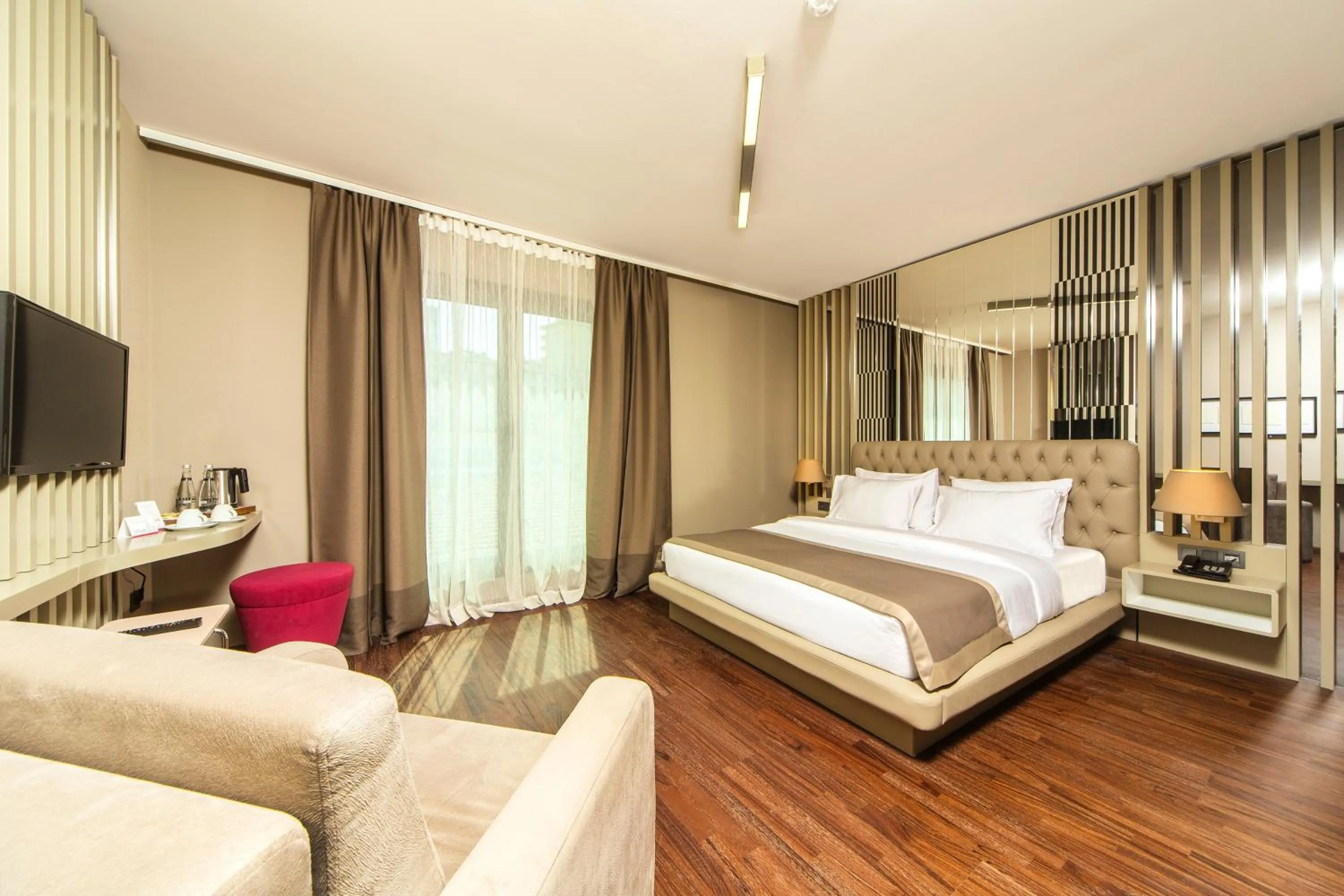 Photo of the whole room, Bed in The City Suites