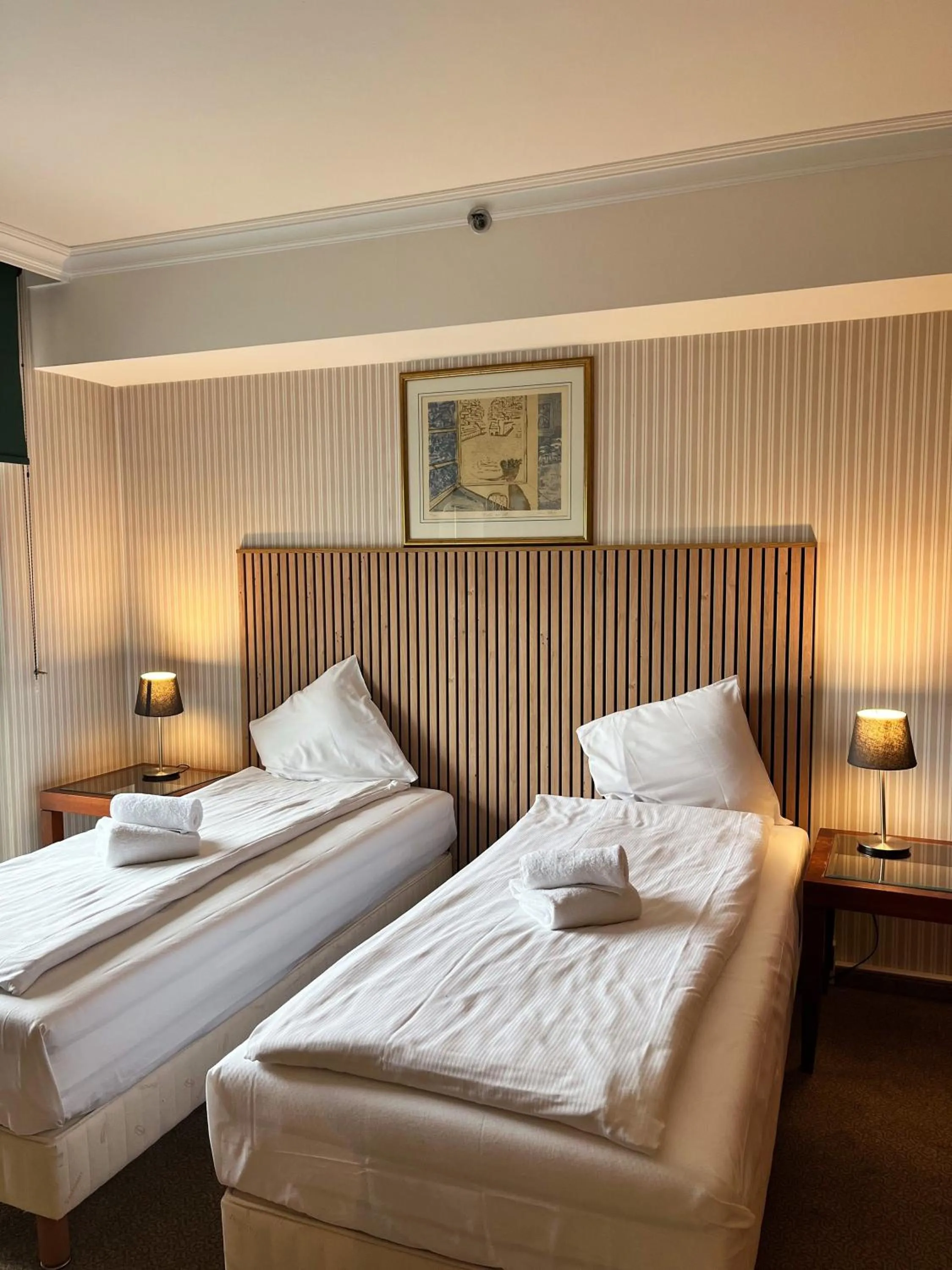 Bed in B-aparthotel Ambiorix