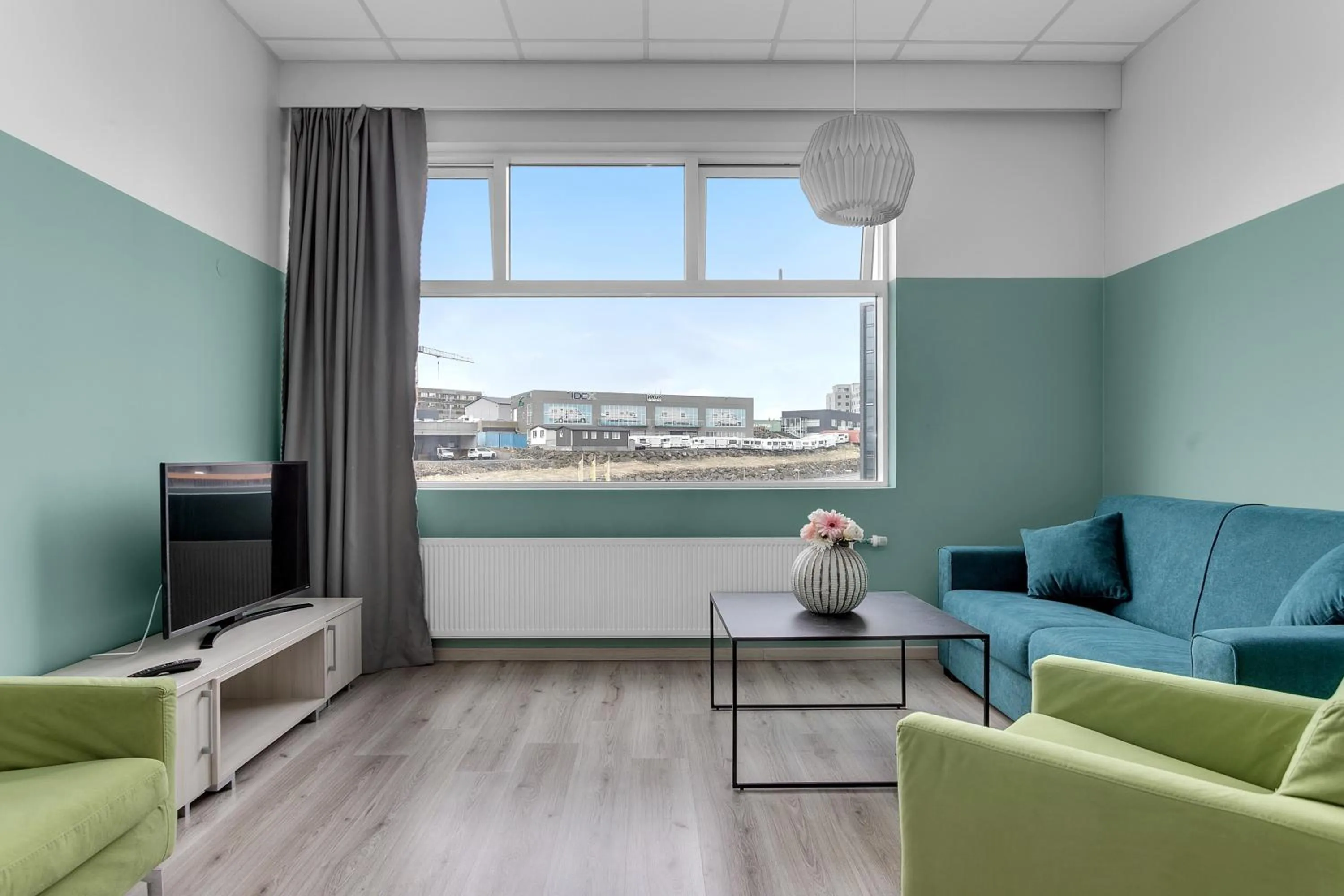 Communal lounge/ TV room in Icelandic Apartments by Heimaleiga