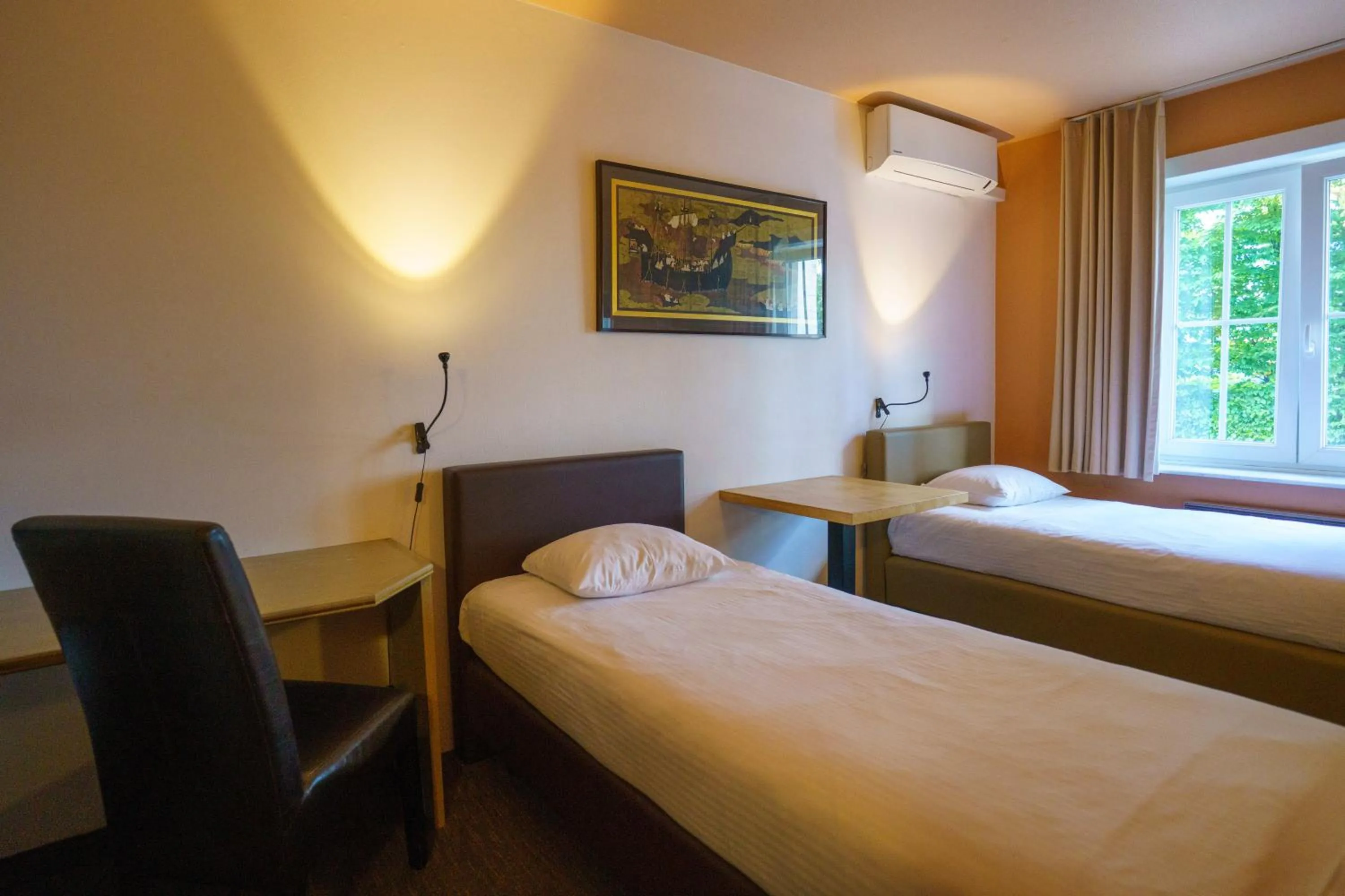 Bed in St-Janshof Hotel