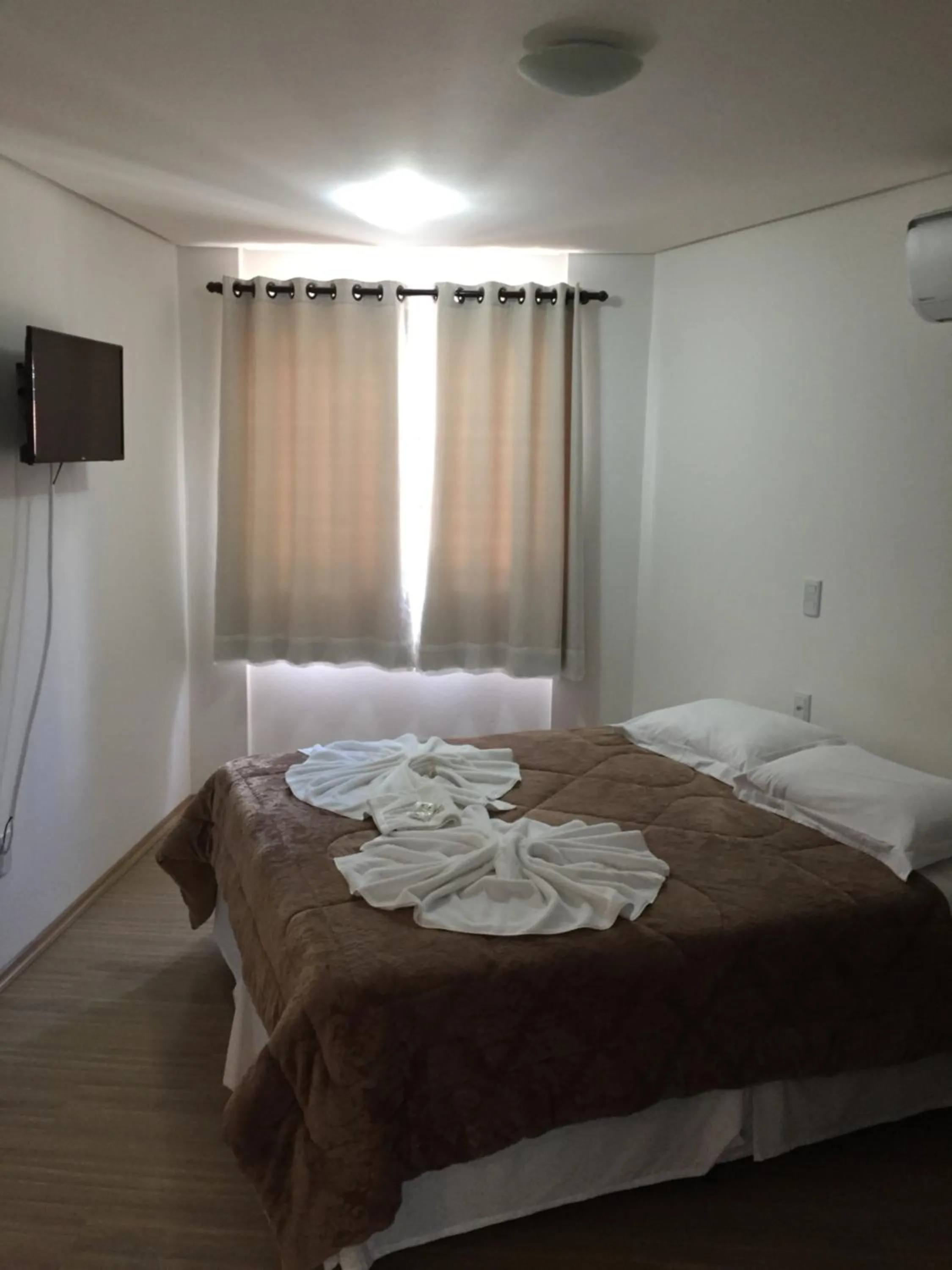 Bed in Pousada Beija Flor Centro