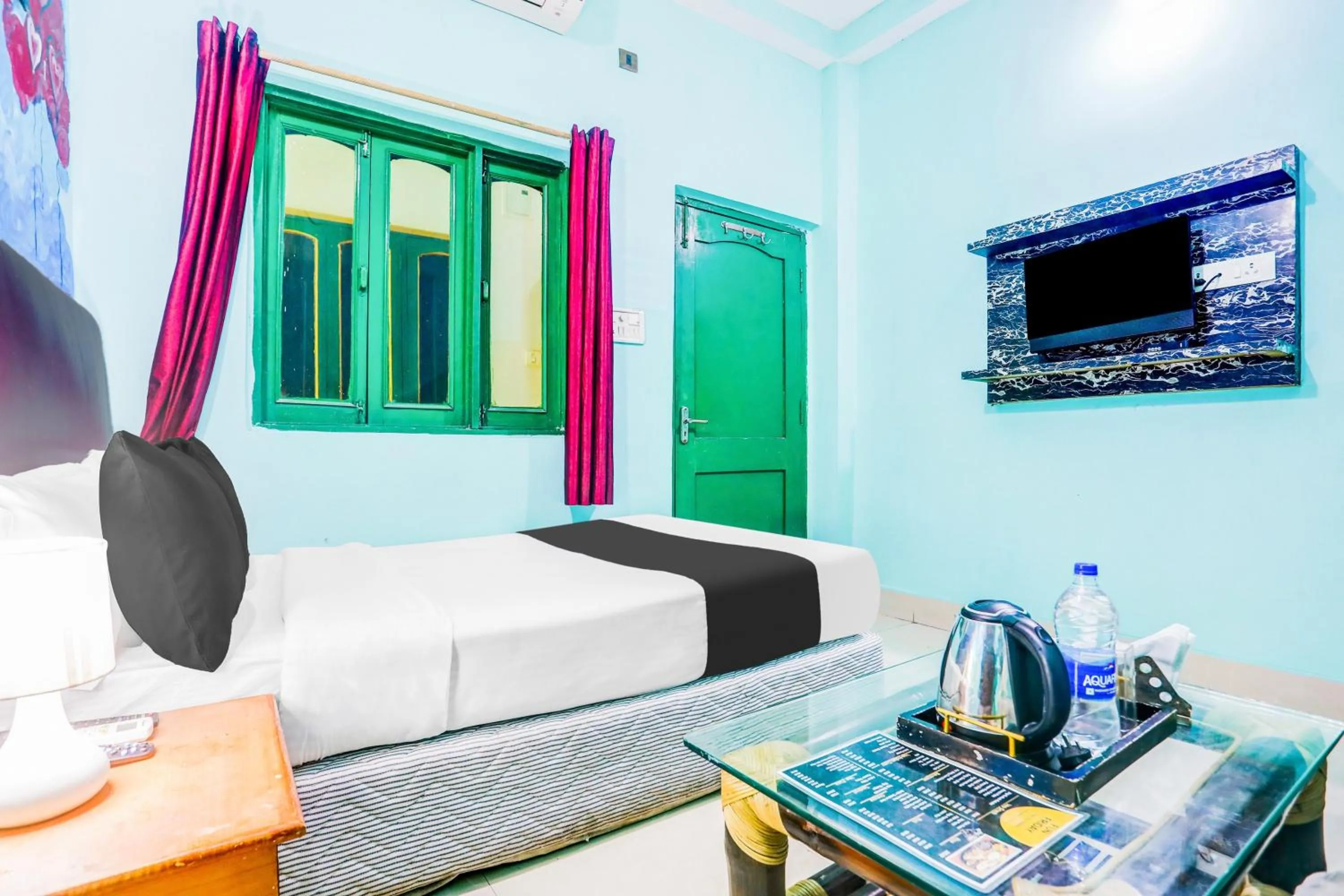 Bedroom in Super Hotel O Bodh Gaya Near Nigma Monastery Formerly Fun Friday