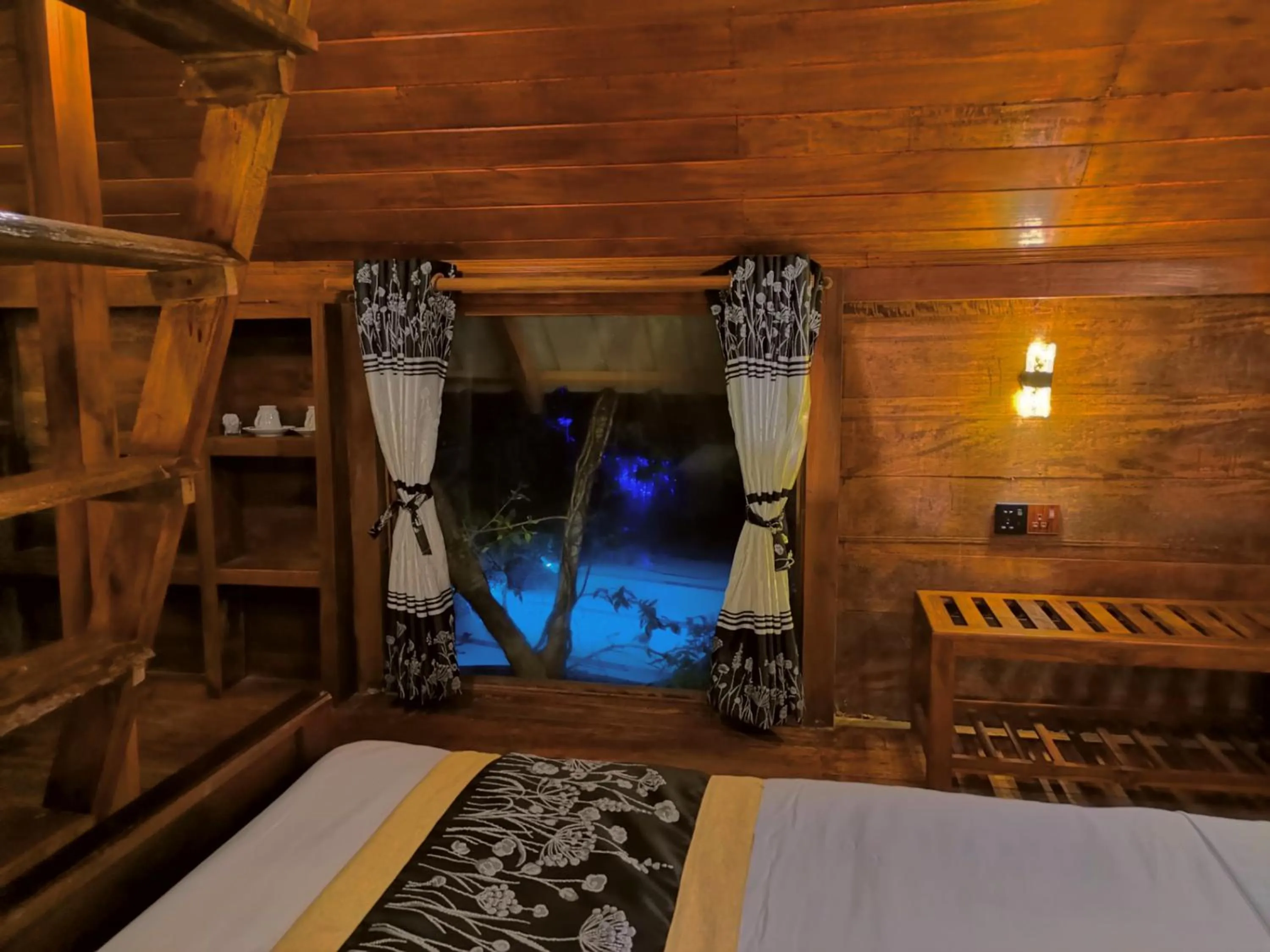 Bed in Levona Garden Resort