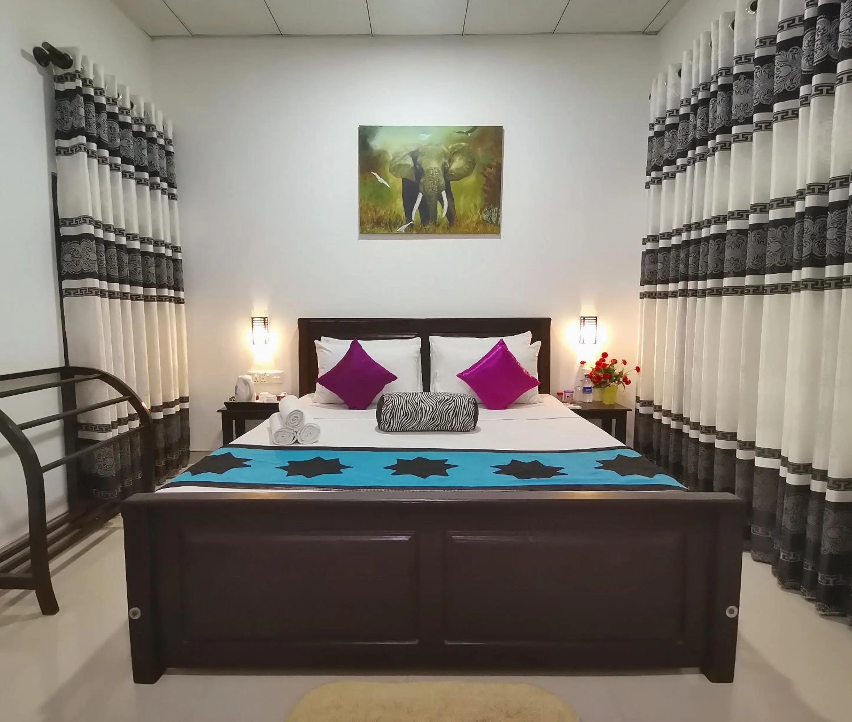 Bed in Levona Garden Resort